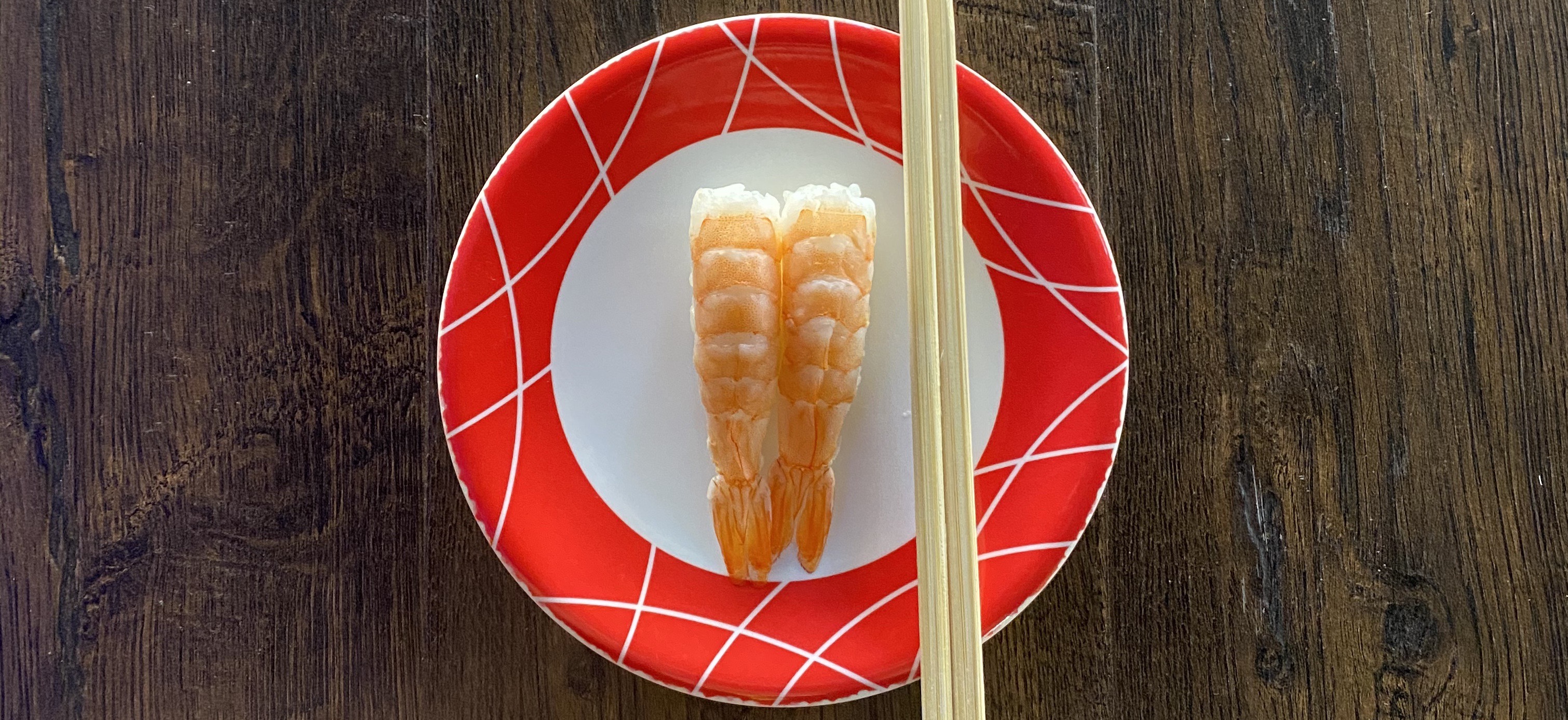 Order Shrimp Nigiri - 2 Pieces food online from Sushi Train store, Minneapolis on bringmethat.com