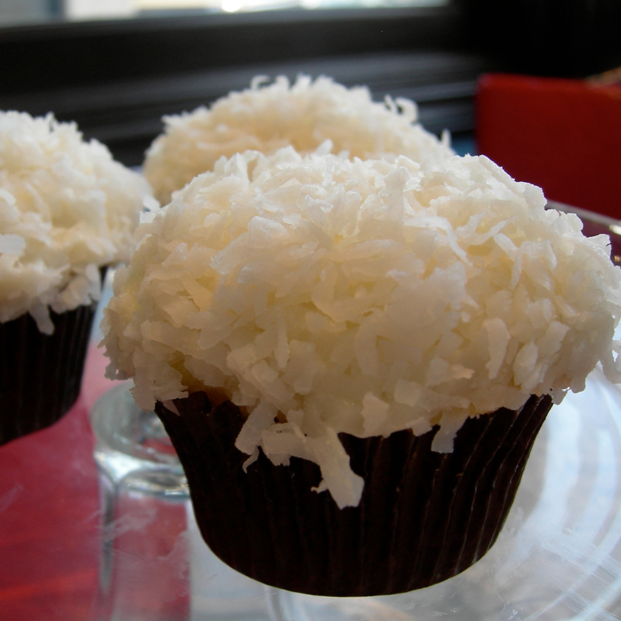 Order Double Coconut Cupcake food online from Big Sugar Bakeshop store, Los Angeles on bringmethat.com