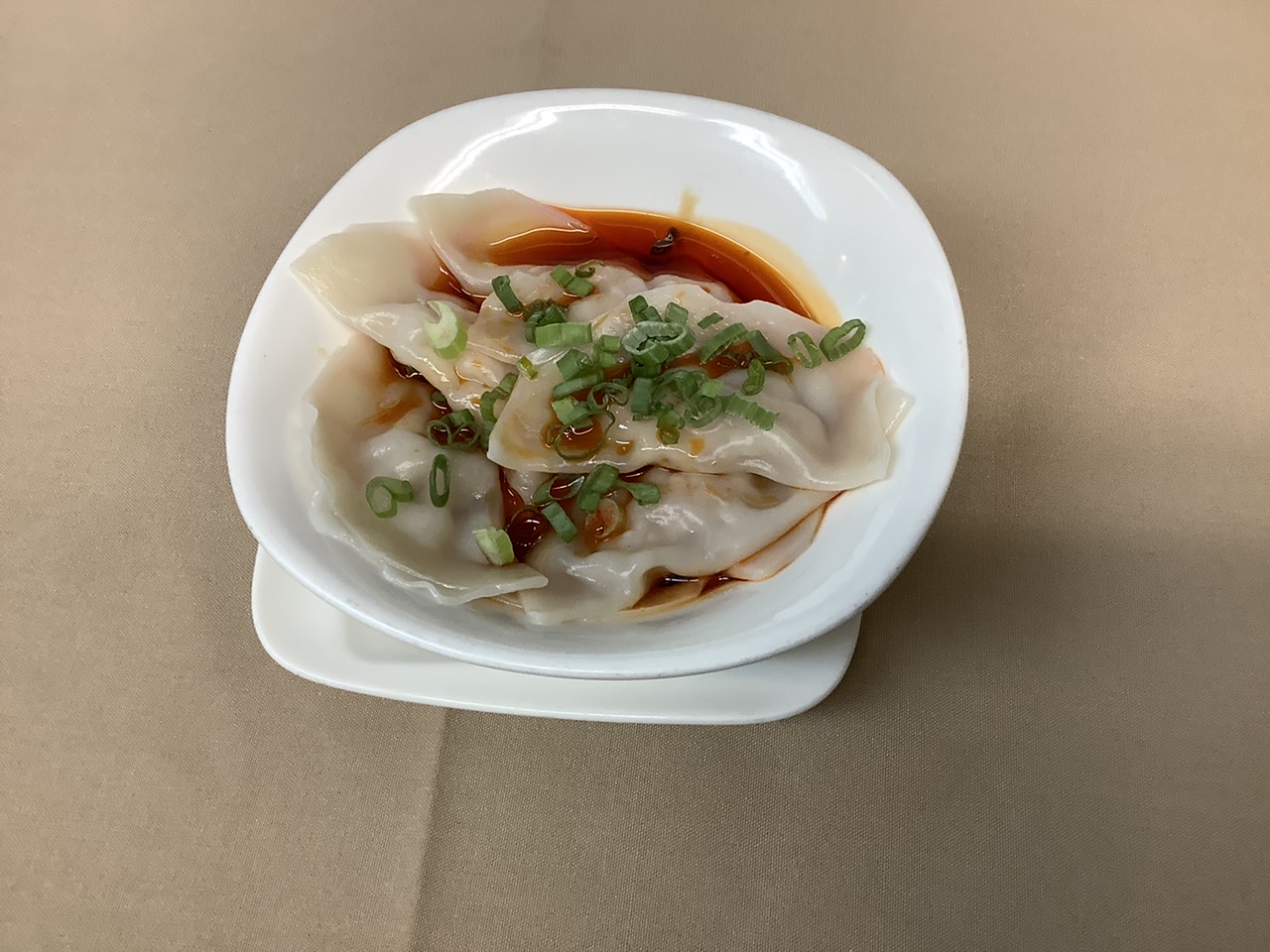 Order 101. Szechuan Pork Dumpling with Chili Soy food online from Land Of Plenty store, New York on bringmethat.com