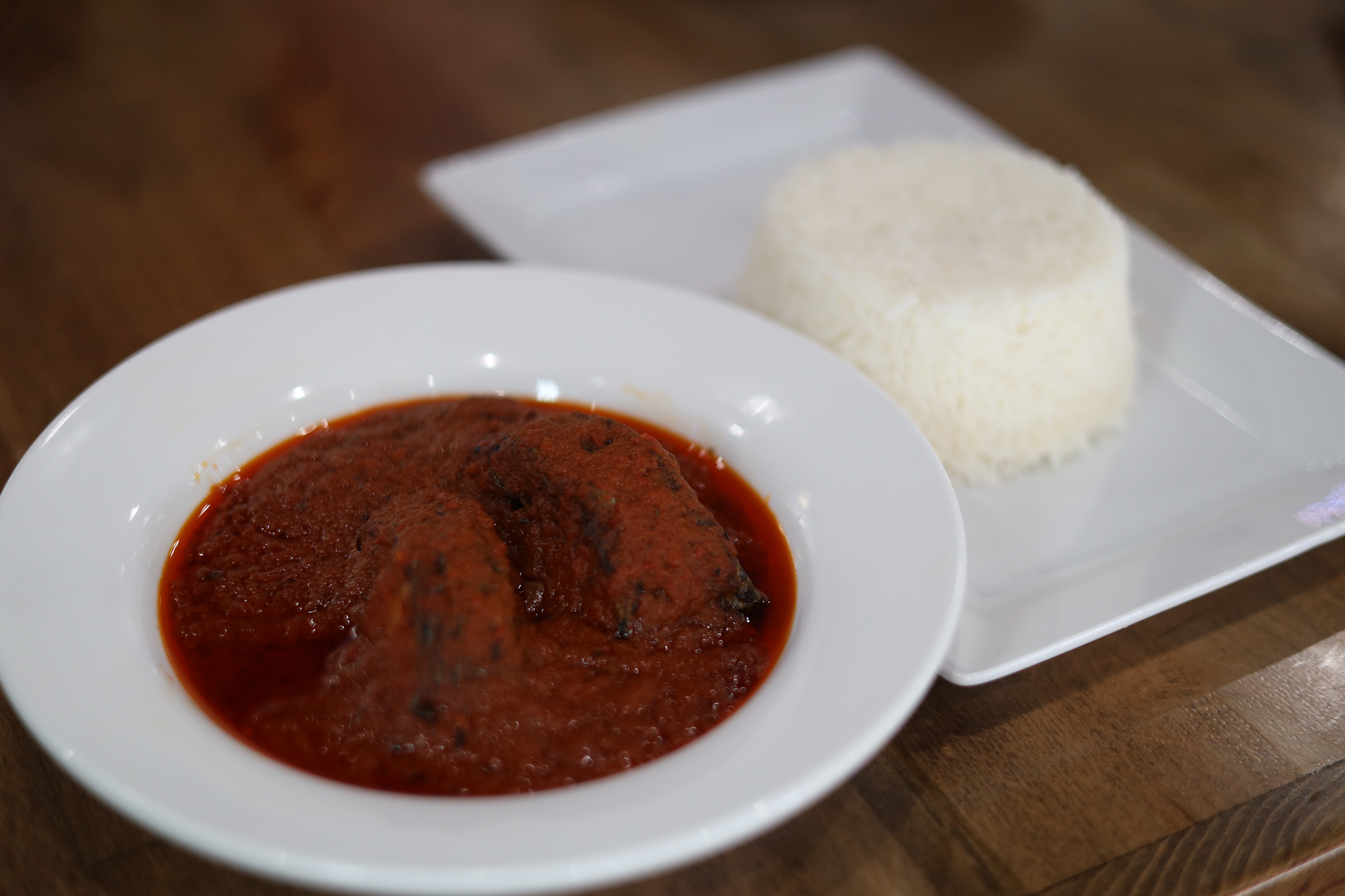 Order White Rice + Fish Stew food online from Fusion Vibes Kitchen + Bar store, Richardson on bringmethat.com