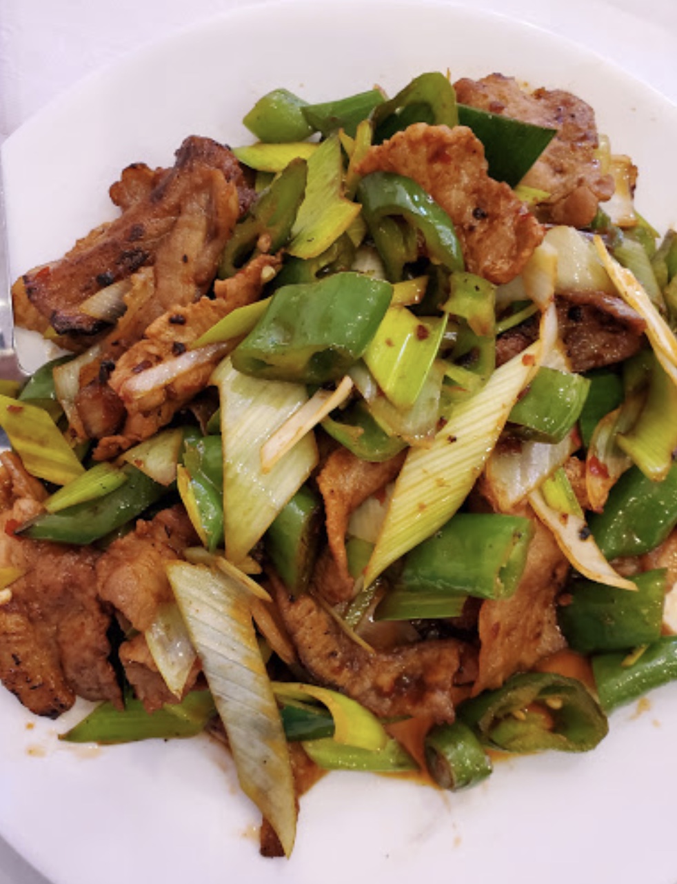 Order Sliced Pork Sauteed with Garlic Stems 生爆盐煎肉 food online from Grand Sichuan store, Jersey City on bringmethat.com