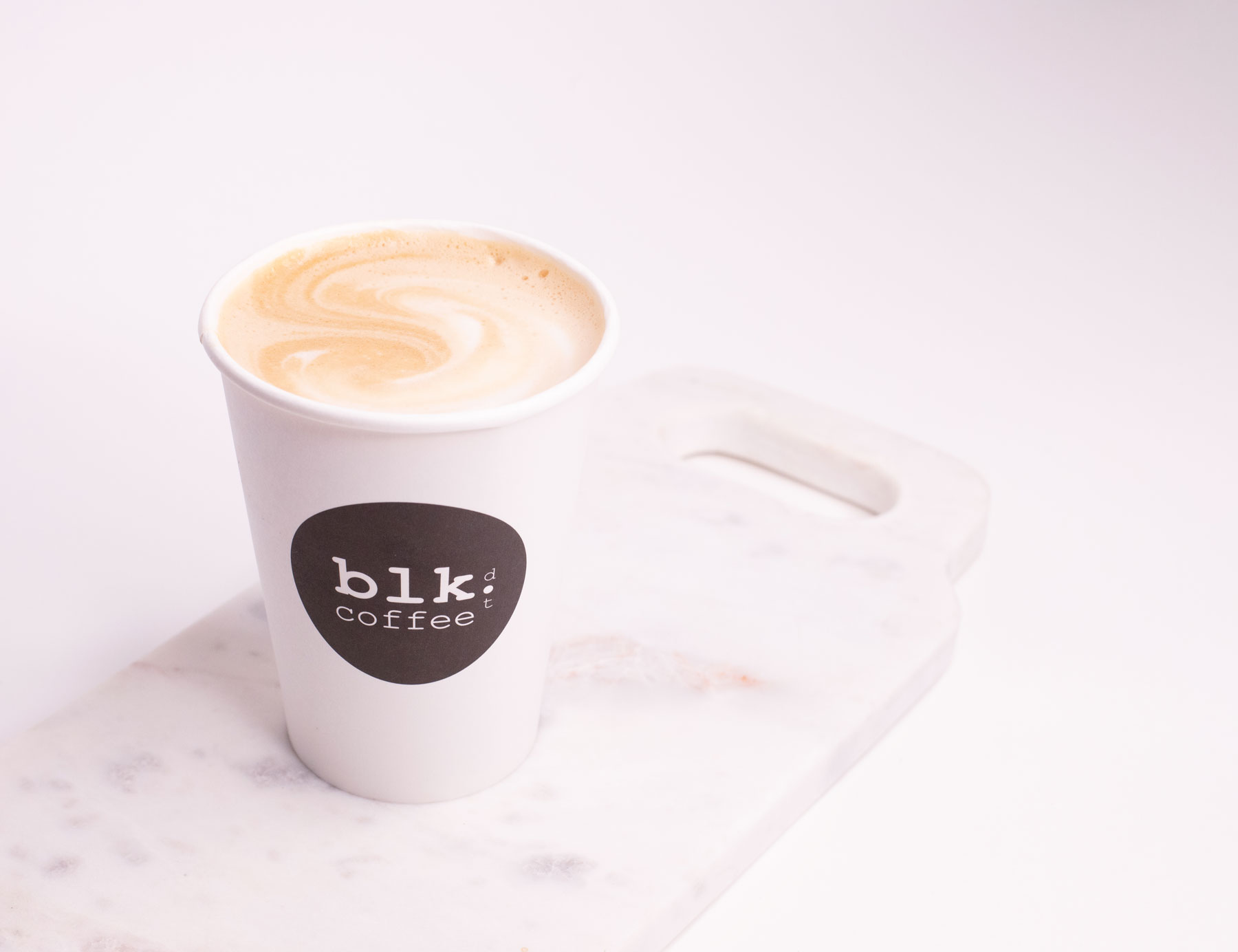 Order Cappuccino Coffee food online from Blk Dot Coffee store, Laguna Beach on bringmethat.com