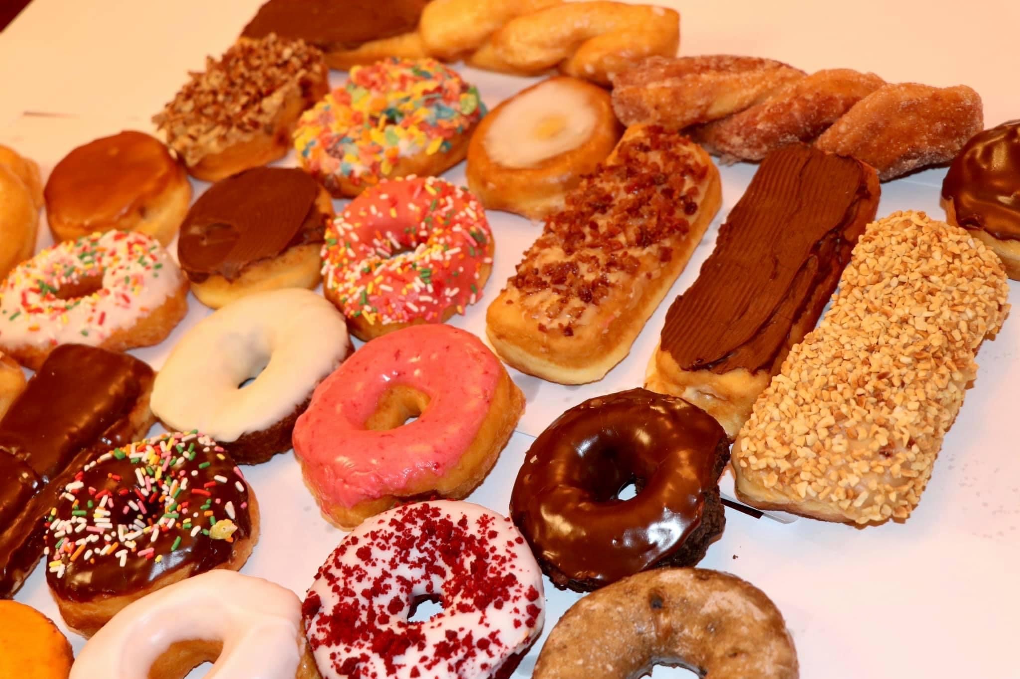 Order 1/2 Dozen Premium Mix  food online from Carl Donuts And Coffee store, Avon on bringmethat.com