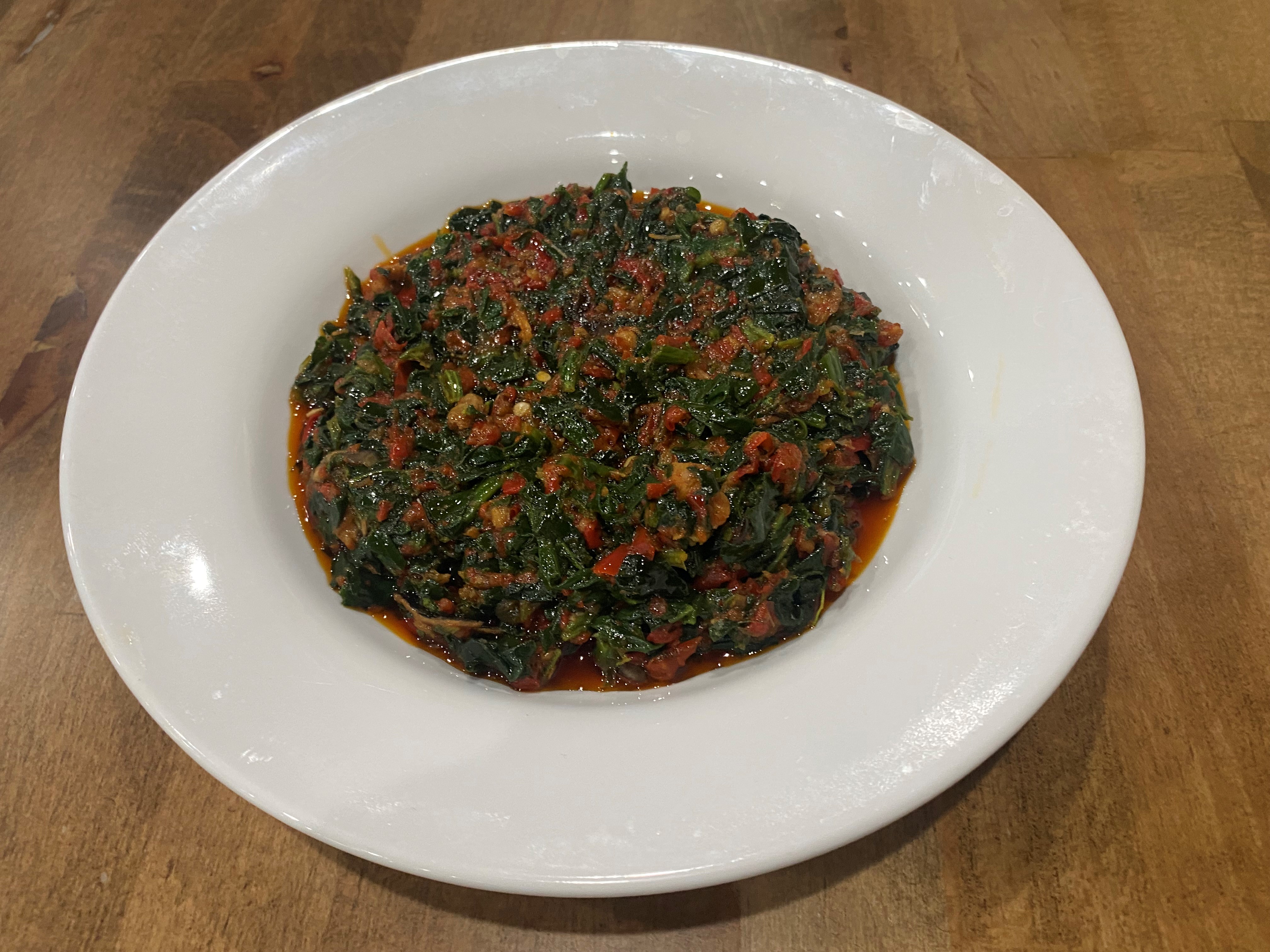 Order Efo Riro-Spinach food online from Fusion Vibes Kitchen + Bar store, Richardson on bringmethat.com