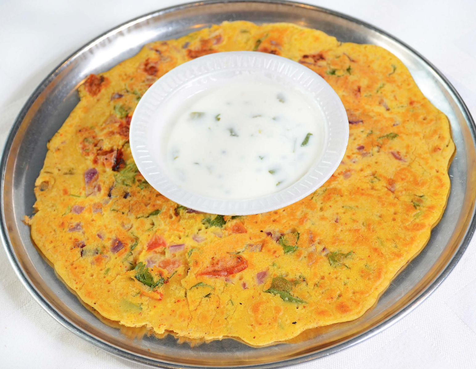 Order Tomato Omlete (Besan Omelet - no egg)  food online from Shri Balaji Bhavan store, Houston on bringmethat.com