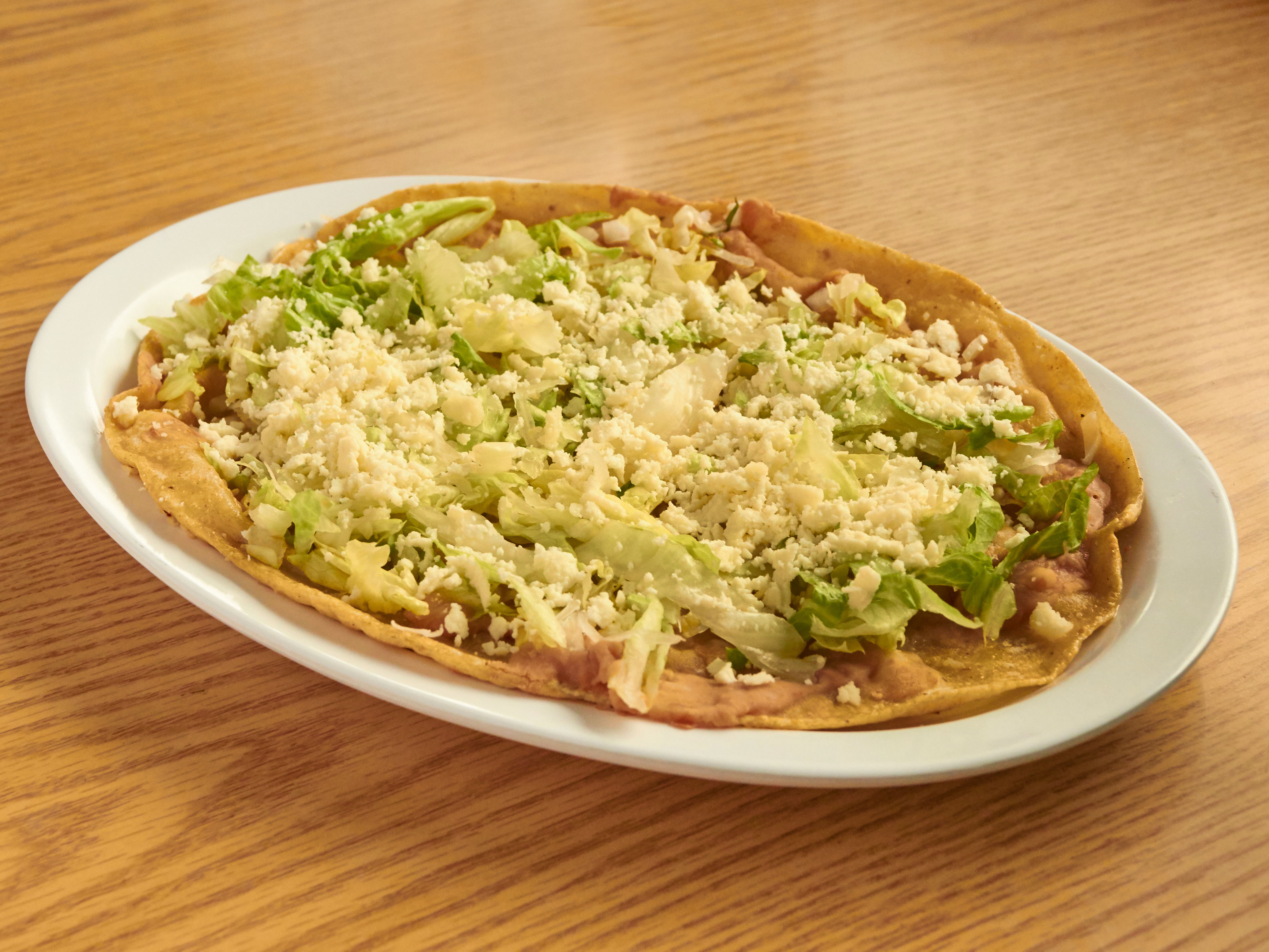Order Huarache Sencillo food online from Tacos El Tio #2 store, Chicago on bringmethat.com