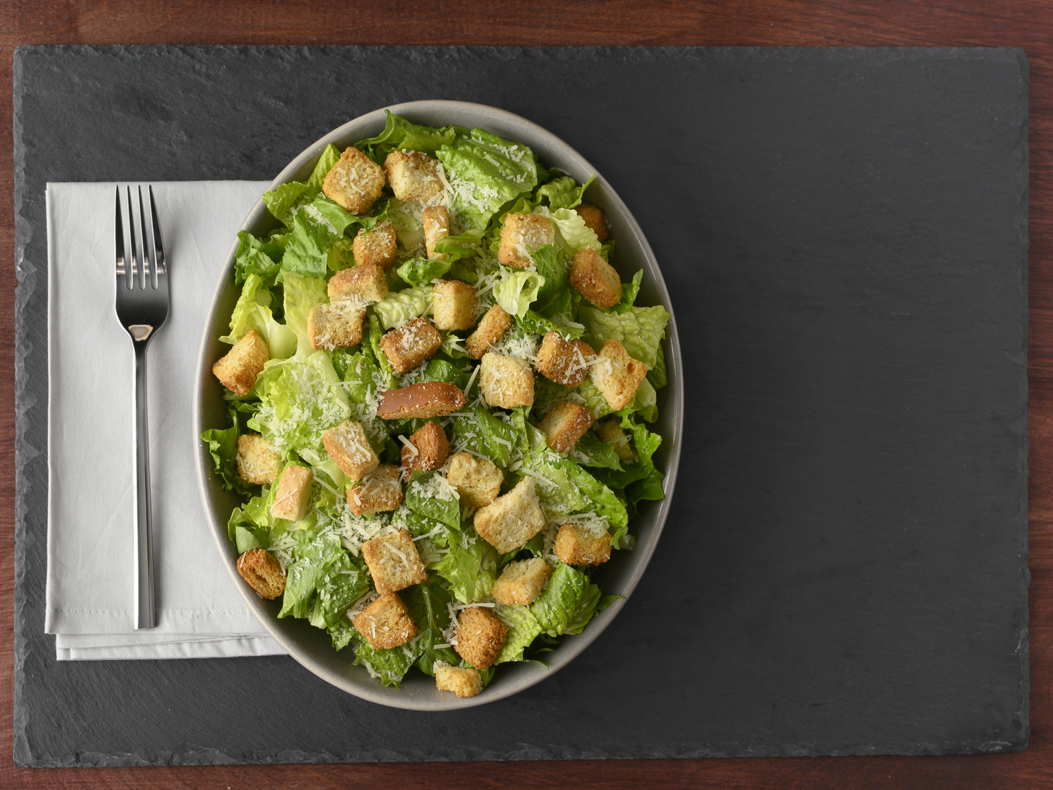 Order Large Caesar Salad food online from Sarpino Pizzeria store, Chicago on bringmethat.com