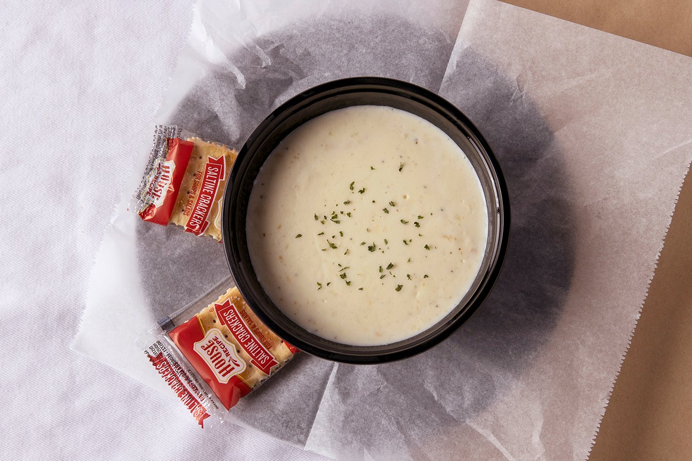 Order Clam Chowder food online from Hook & Reel Cajun Seafood store, West Valley City on bringmethat.com