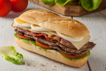 Order Chivito al Pan Sandwich Lunch food online from Farina Caffe store, Nyack on bringmethat.com