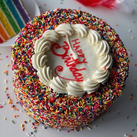 Order 10" Rainbow Cake food online from Carlo's Bakery store, Las Vegas on bringmethat.com