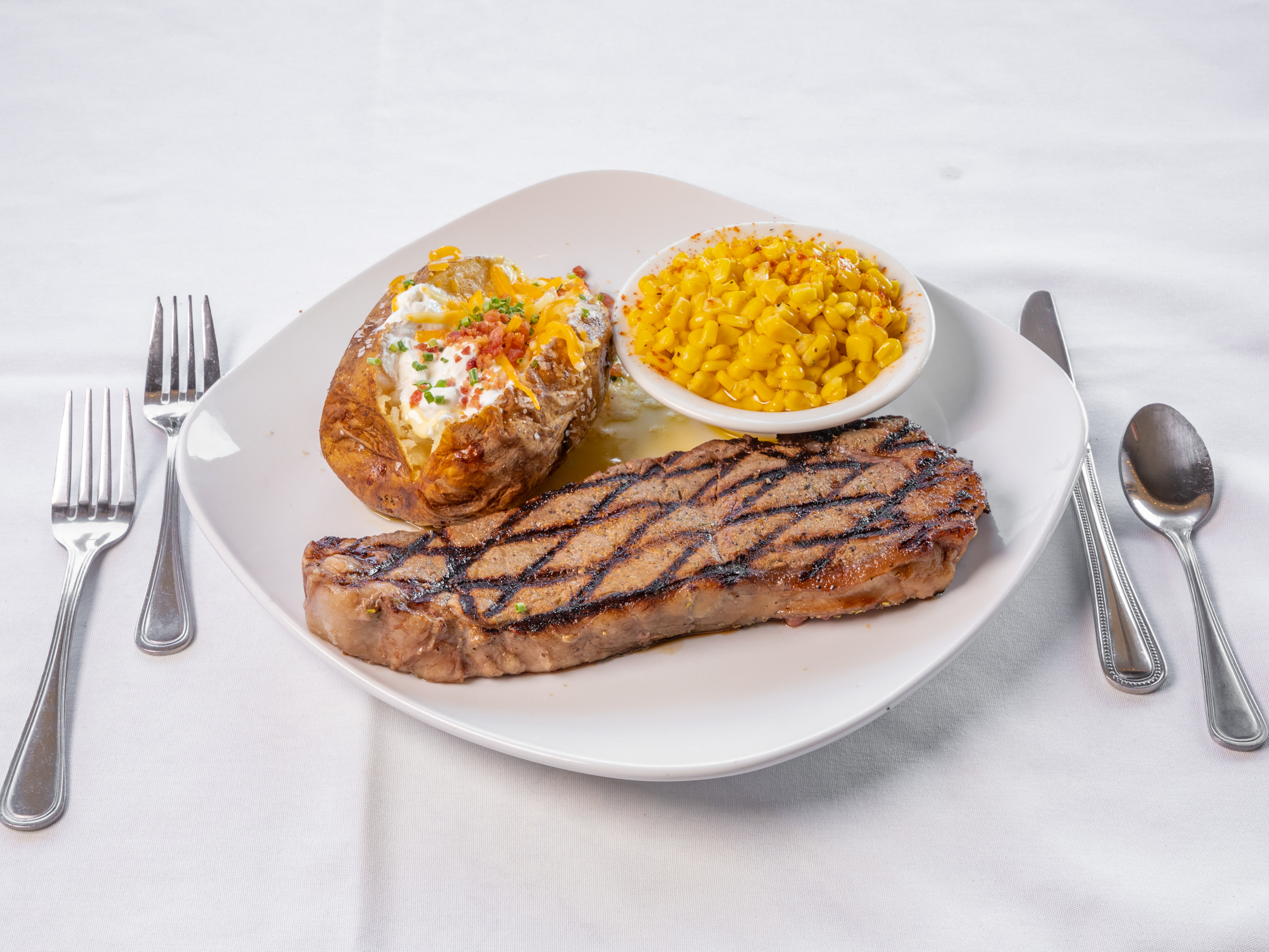 Order New York Strip food online from Famous Steakhouse store, Tulsa on bringmethat.com