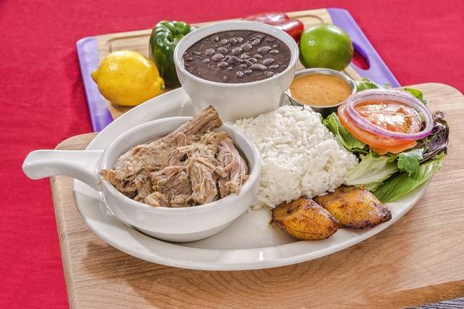 Order Lechon Asado Entree food online from Papi Cuban store, Kennesaw on bringmethat.com