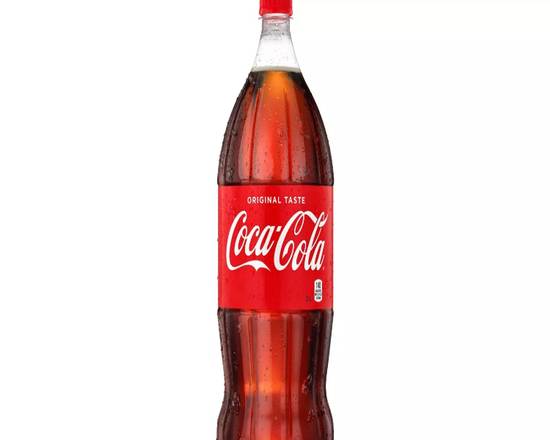 Order  Coca-Cola - 2 L Bottle food online from Starway Liquor store, Bell Gardens on bringmethat.com