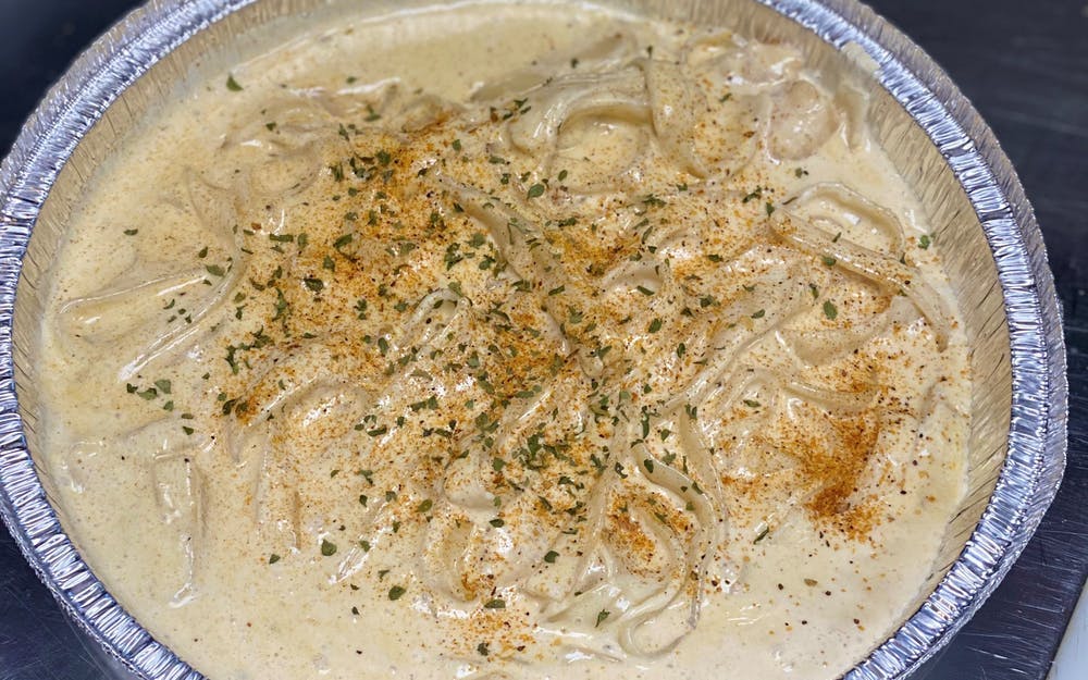 Order New Orleans Pasta with Grilled Chicken - Dinner food online from Three Brothers Italian Restaurant store, Bowie on bringmethat.com