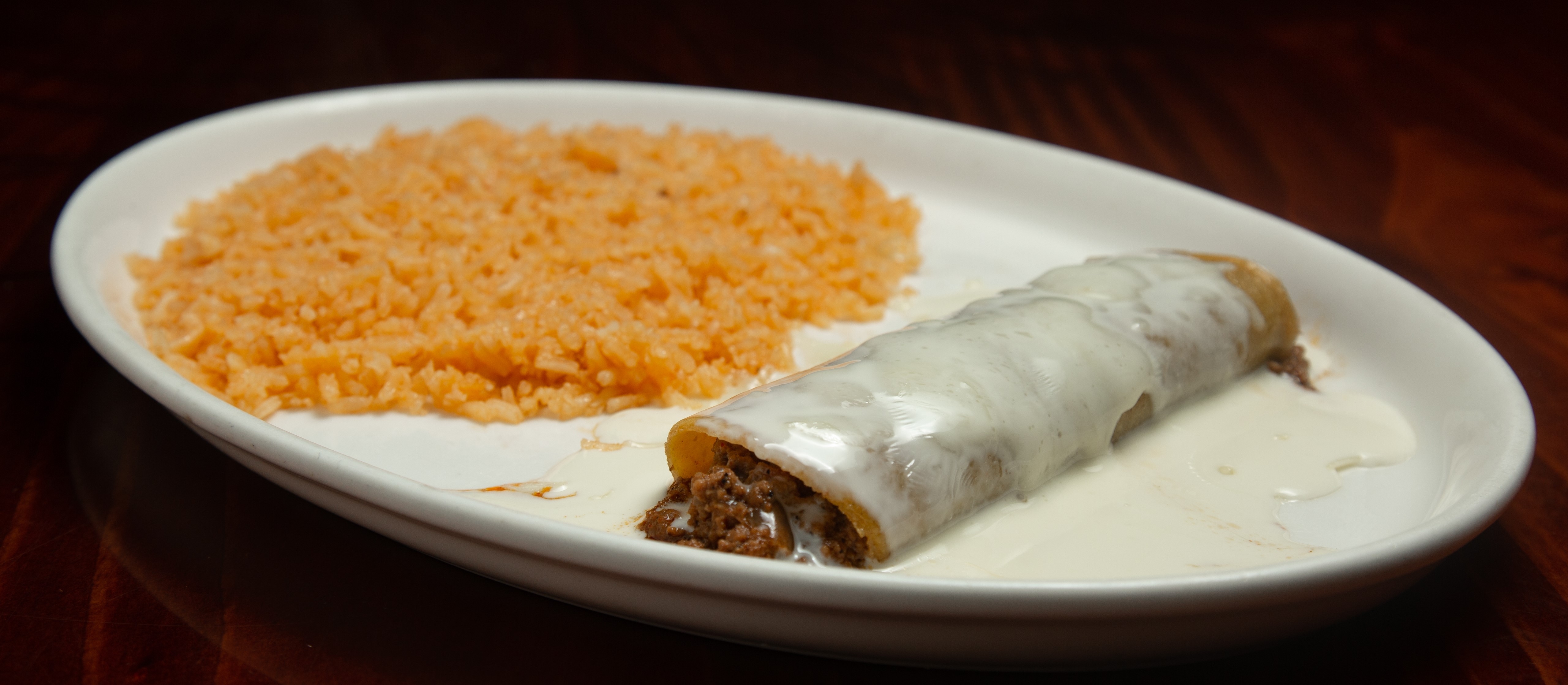Order Kid's Beef Enchilada food online from Tito Mexican Restaurant store, Spring Hill on bringmethat.com