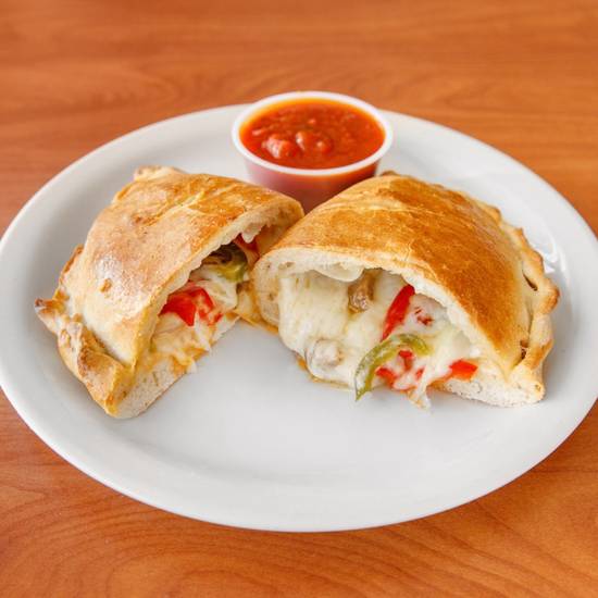 Order Deluxe Calzone food online from Pronto Pronto Pizza store, Inglewood on bringmethat.com