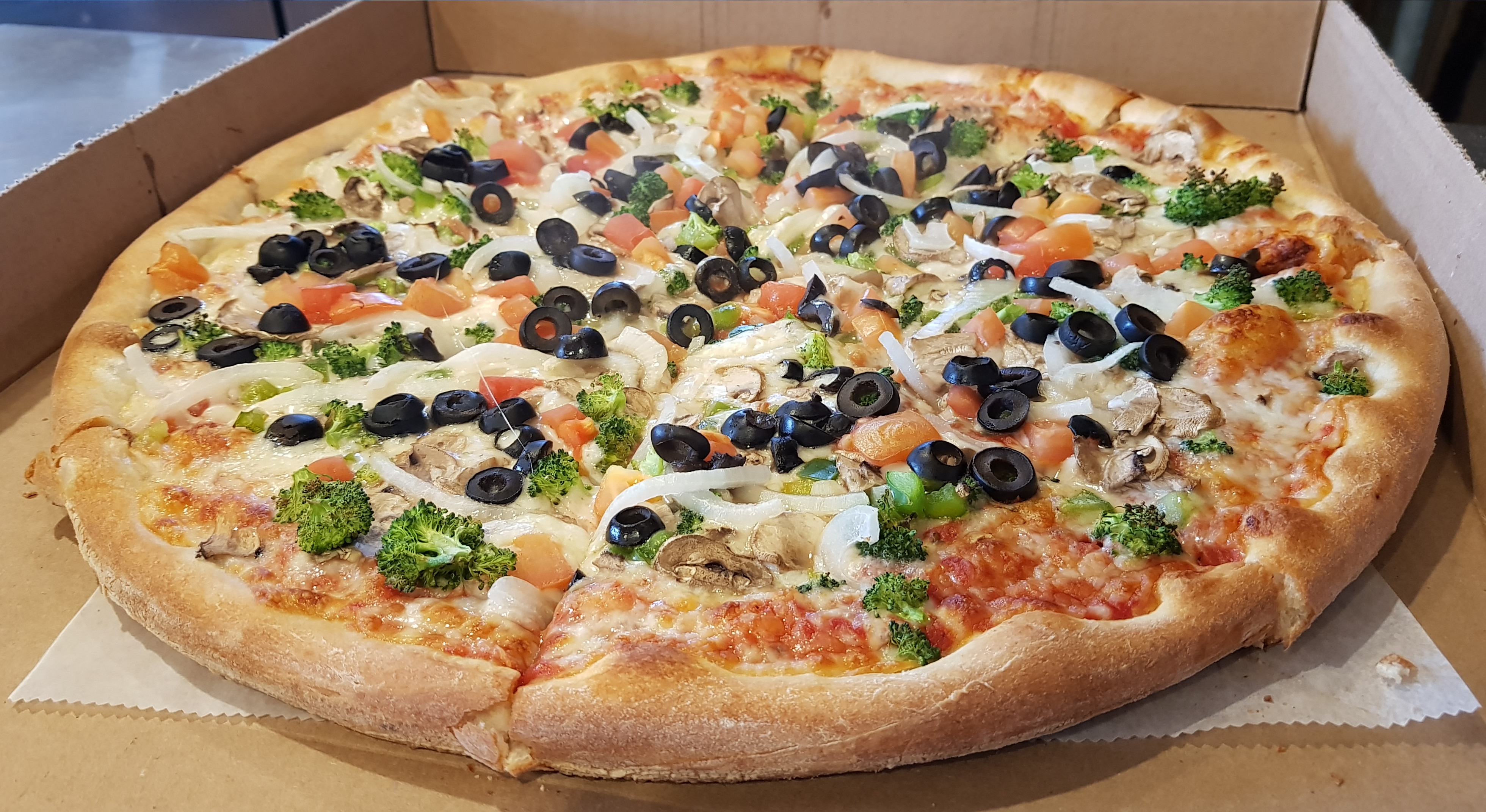 Order Farmers Delight Pizza food online from Two Cousins Paradise store, Paradise on bringmethat.com