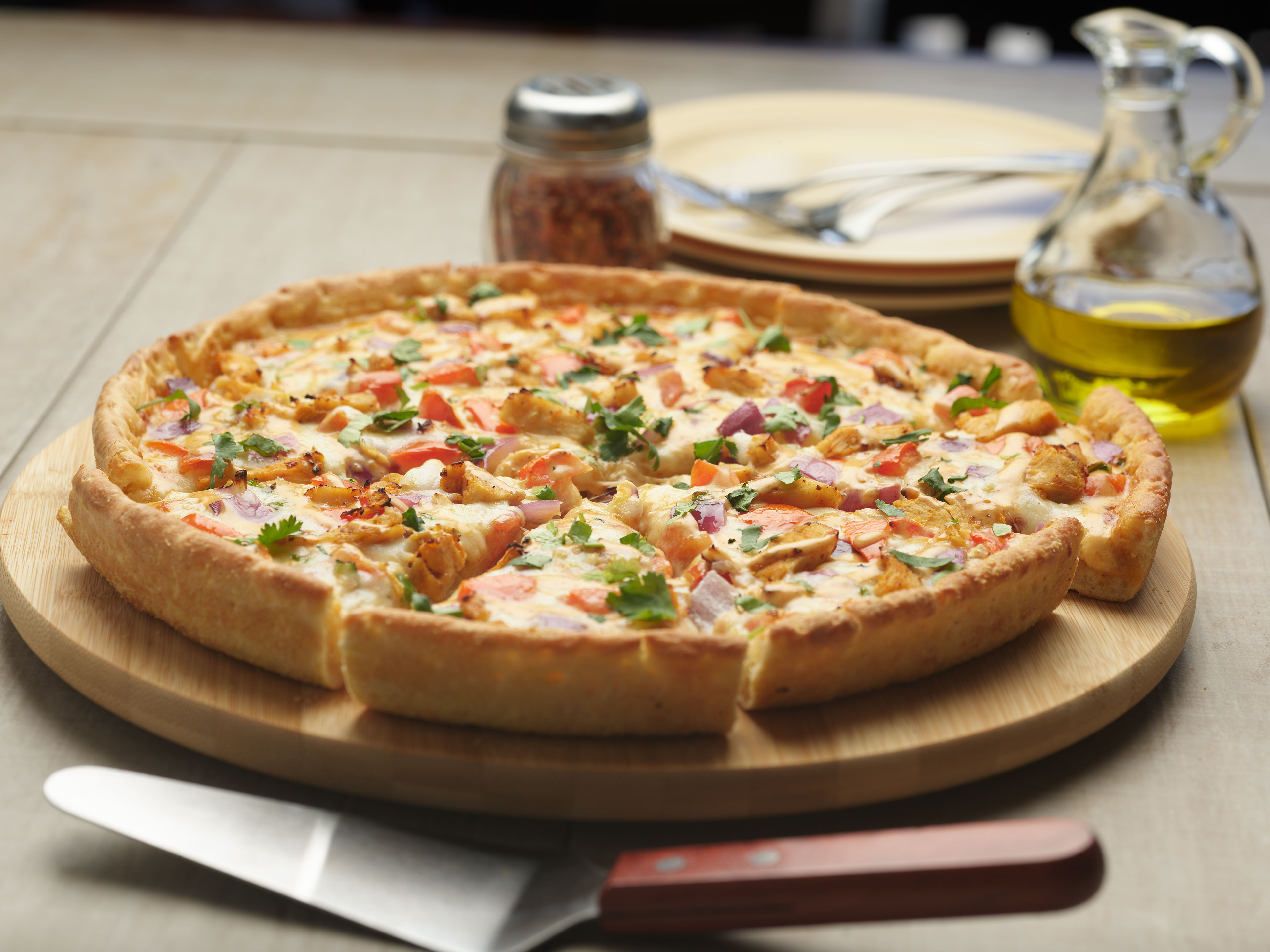 Order Butter Chicken Pizzatwist food online from Chicago's Pizza With A Twist store, Folsom on bringmethat.com