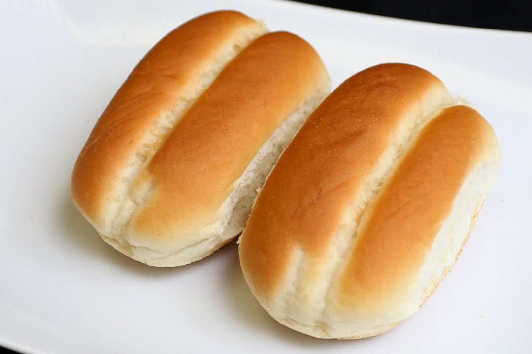 Order 2 Dinner Rolls food online from Two Brothers Chicken store, Woodbridge on bringmethat.com