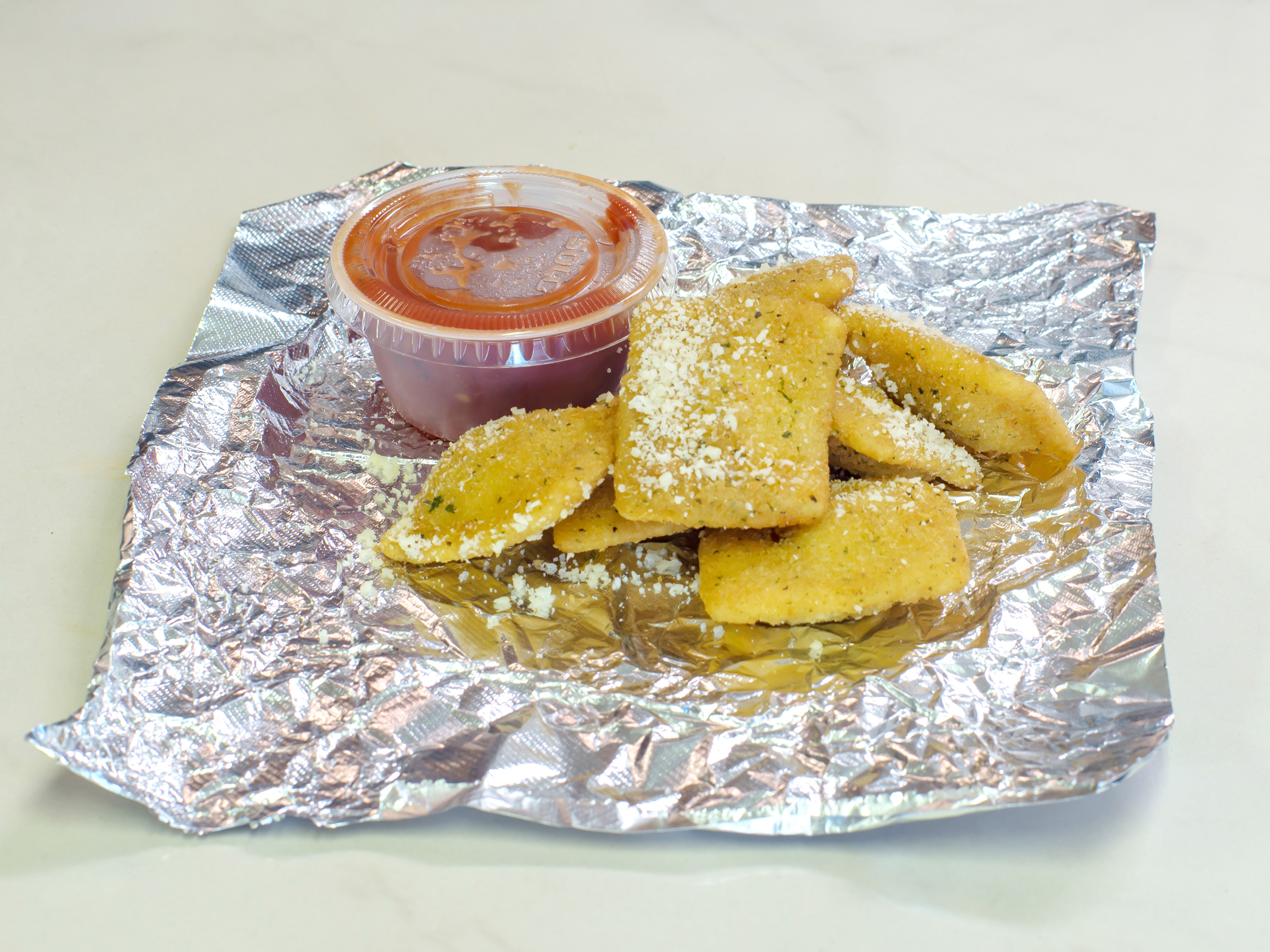 Order Toasted Ravioli food online from Hot Box Pizza & Wings store, South Park Township on bringmethat.com