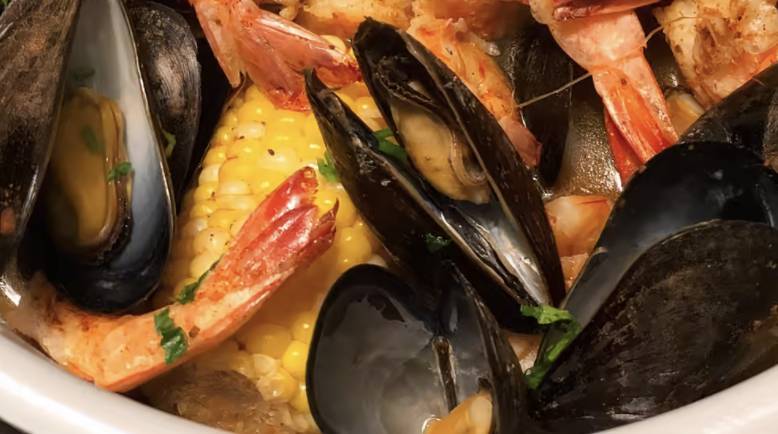 Order Black Mussel 1/2 LB food online from Red Hook Cajun Seafood & Bar store, Southaven on bringmethat.com