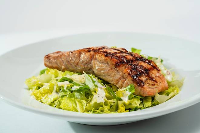 Order GF GRILLED SALMON CAESAR SALAD food online from Glory Days Grill store, Hunter Mill on bringmethat.com