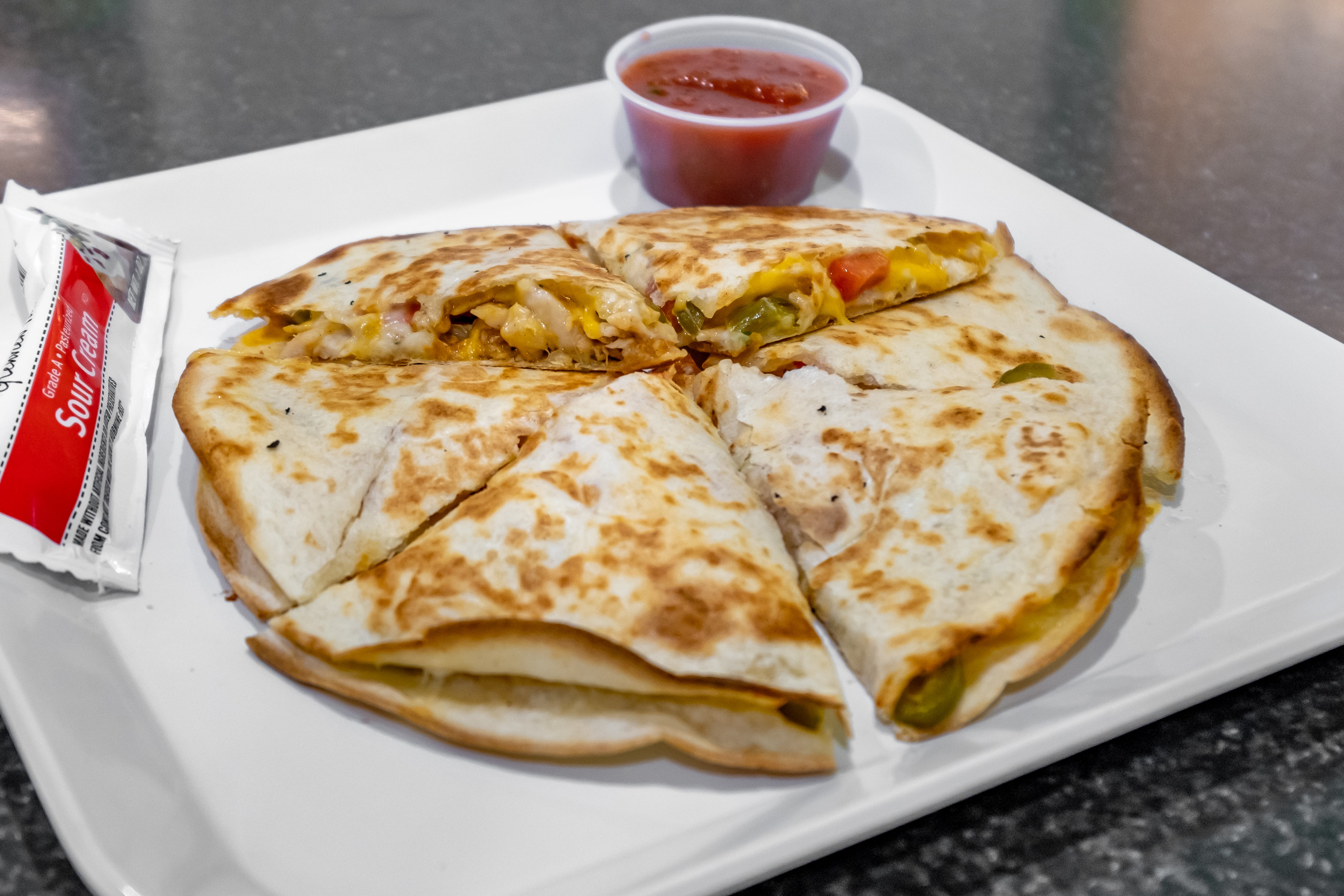 Order Quesadilla with Chicken - Mexican Specialties food online from Brother's Pizza store, Newville on bringmethat.com