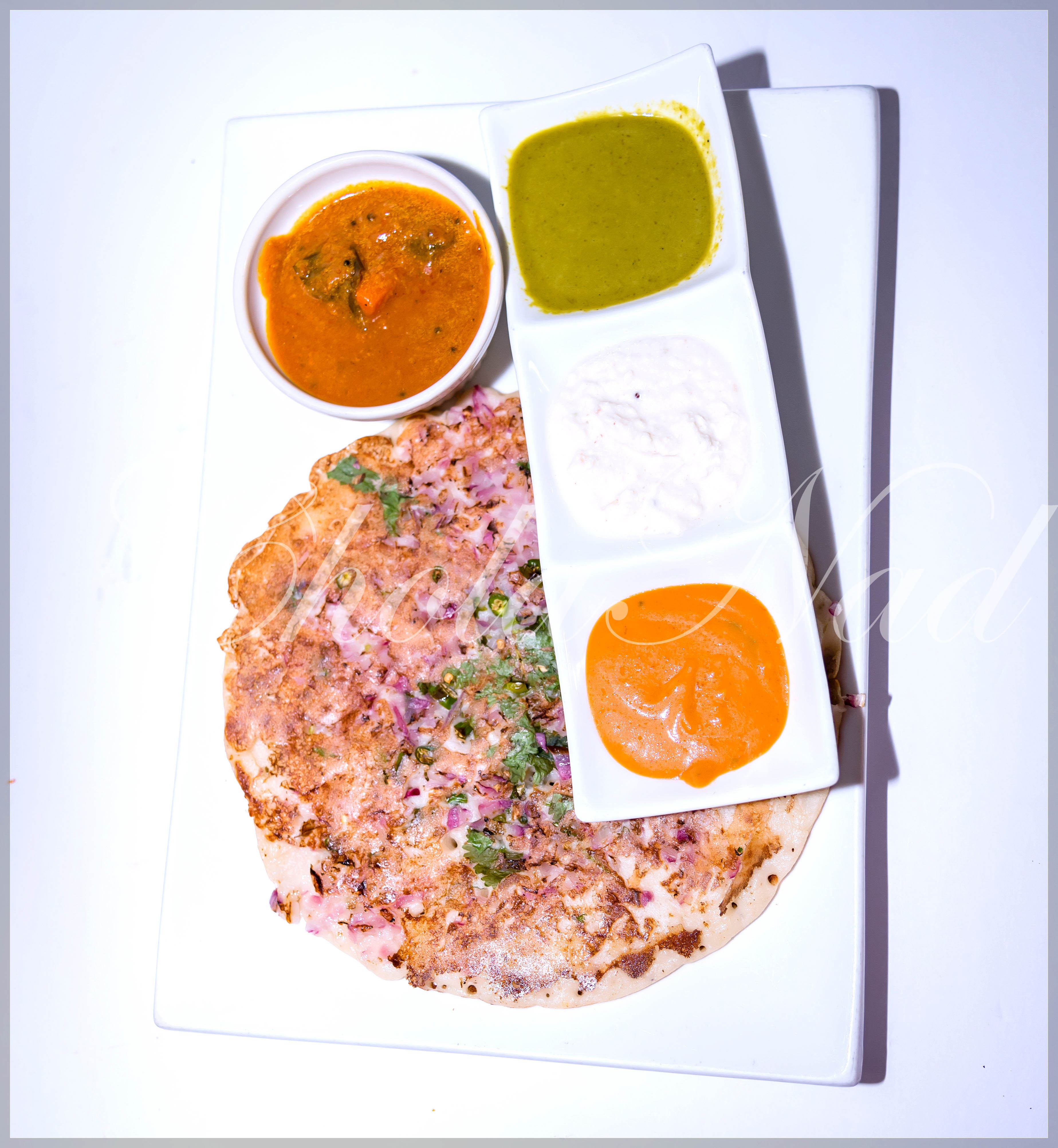 Order Plain Uthappam food online from Cholanad store, Chapel Hill on bringmethat.com