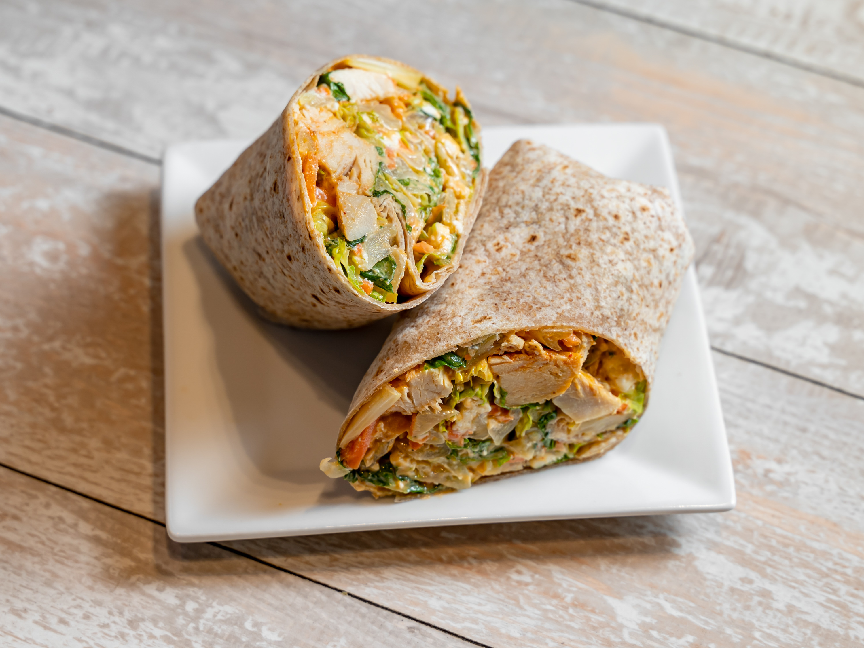 Order Buffalo Chicken Wrap food online from Cafe Metro store, New York on bringmethat.com