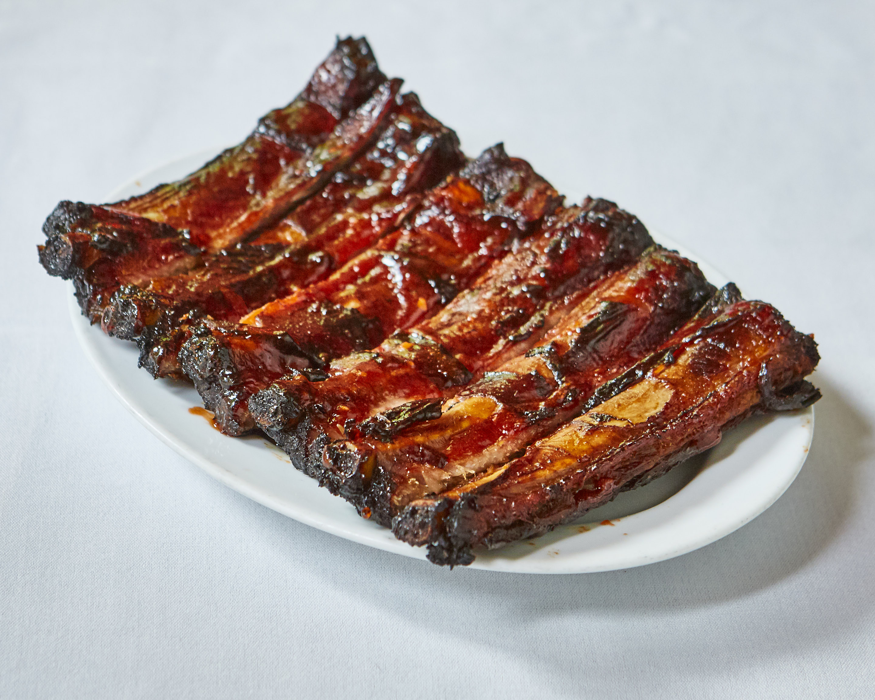 Order 2. Cantonese BBQ Spare Ribs food online from Ollie's Sichuan store, New York on bringmethat.com