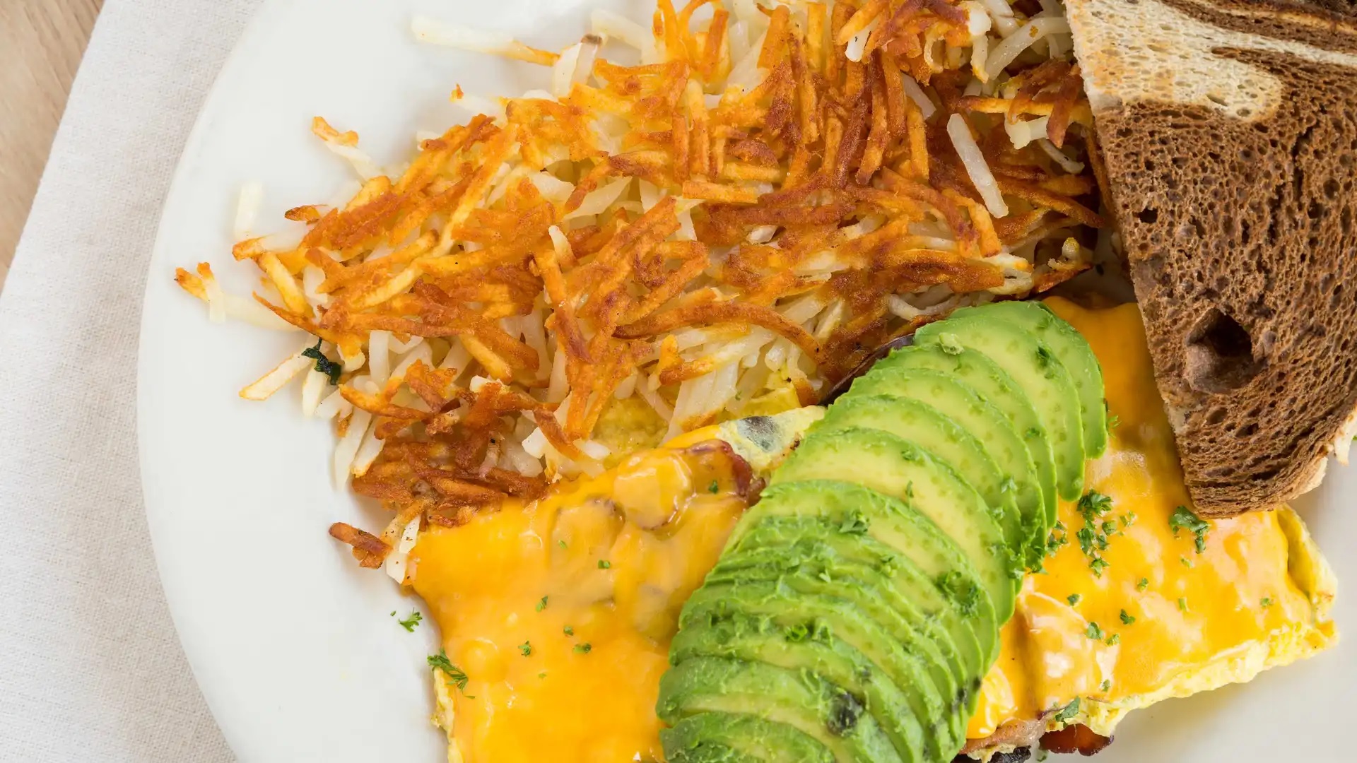 Order Bacon Avocado Omelet food online from Royal Donut Cafe store, Burlingame on bringmethat.com