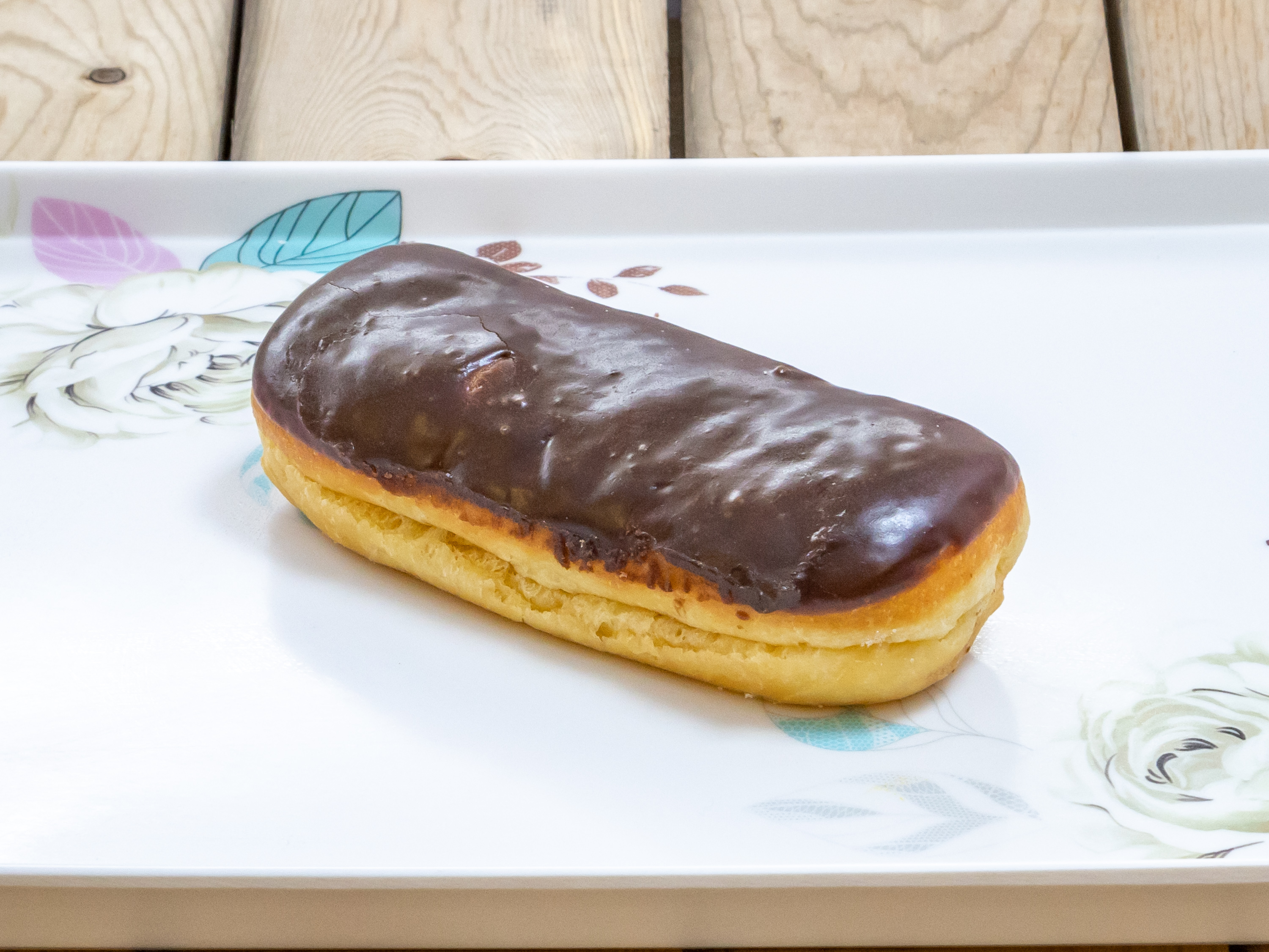 Order Eclair Donut food online from Cotton Candy Donuts store, Dallas on bringmethat.com