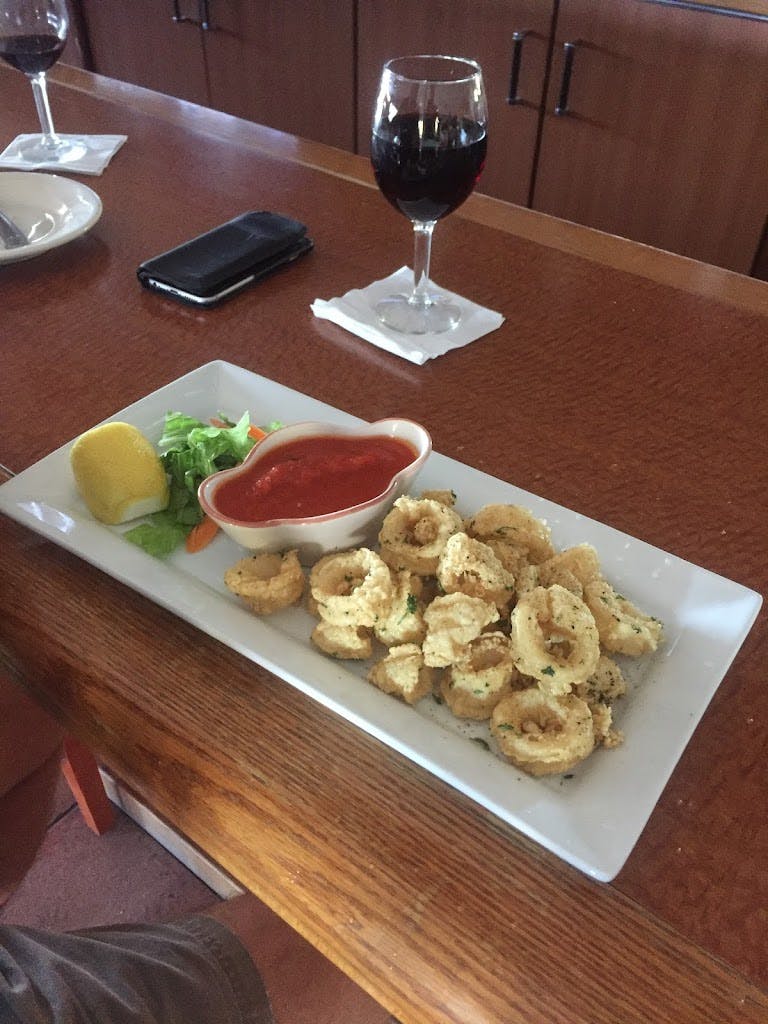 Order Fried Calamari - Appetizer food online from Natalino Italian Restaurant store, Phoenix on bringmethat.com