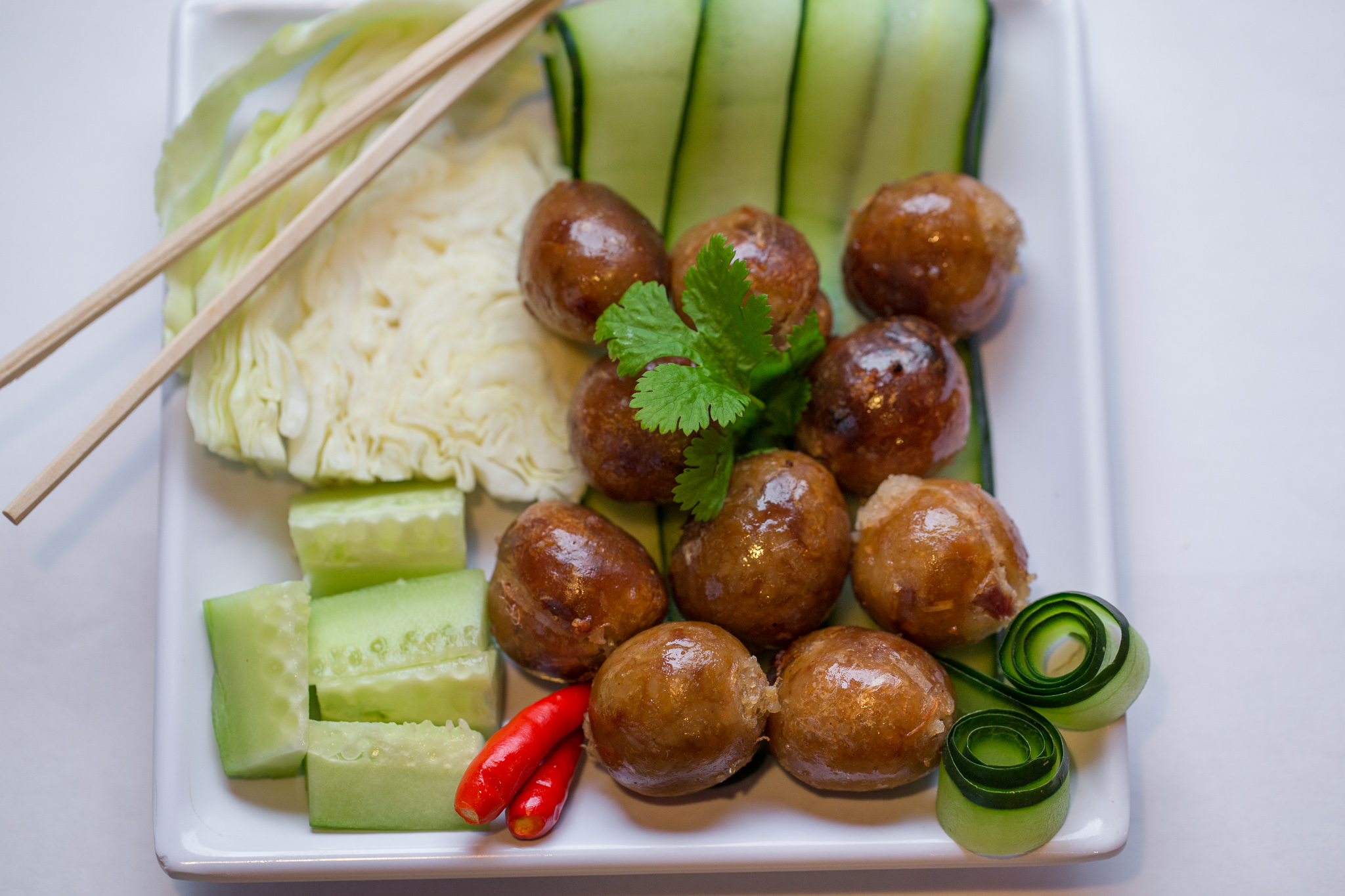 Order Rice Ball Sausages food online from Salween Thai Restaurant store, Omaha on bringmethat.com