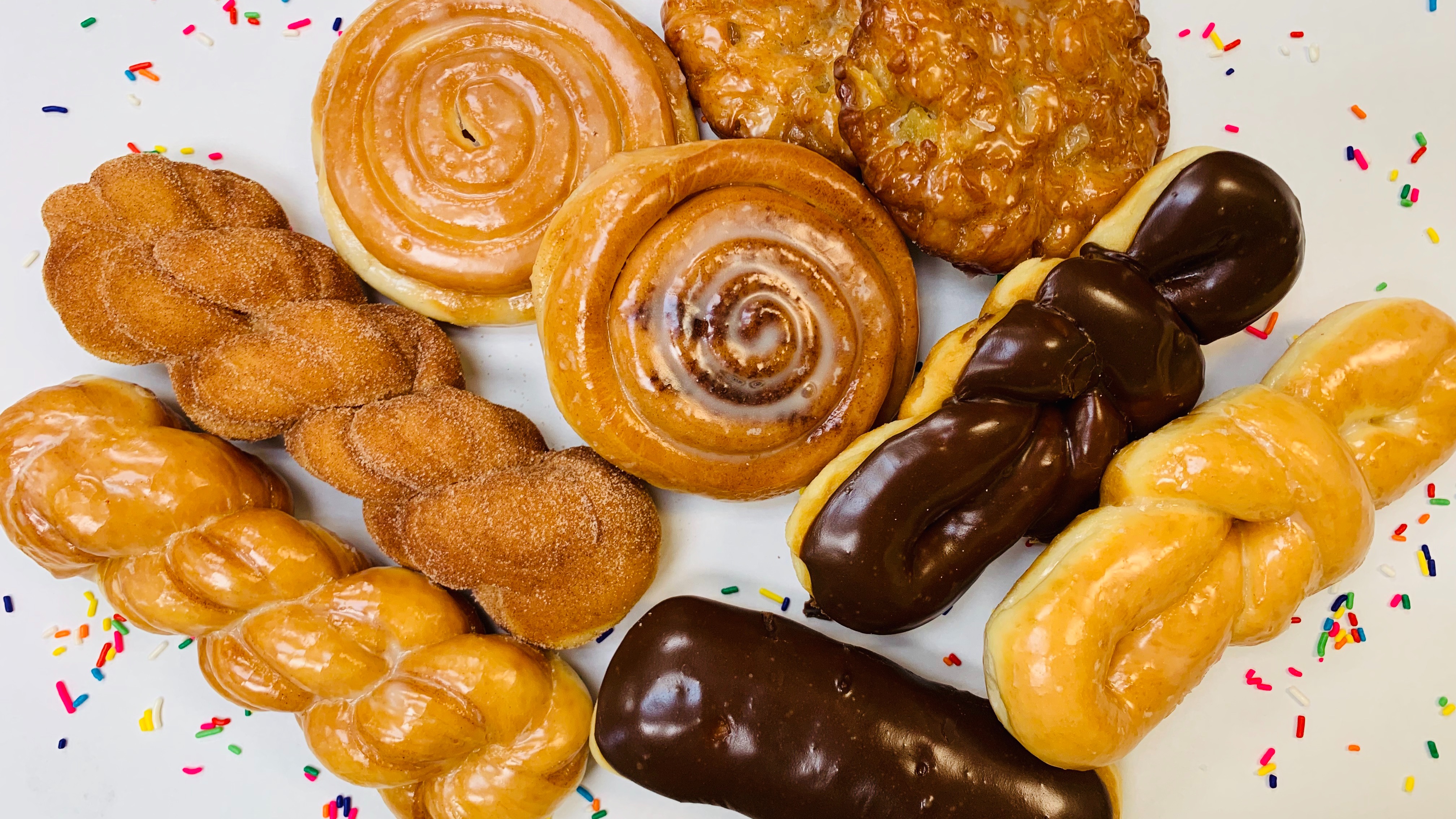 Order 1 Dozen Fancy Donuts food online from Daylight Donuts store, Hilliard on bringmethat.com
