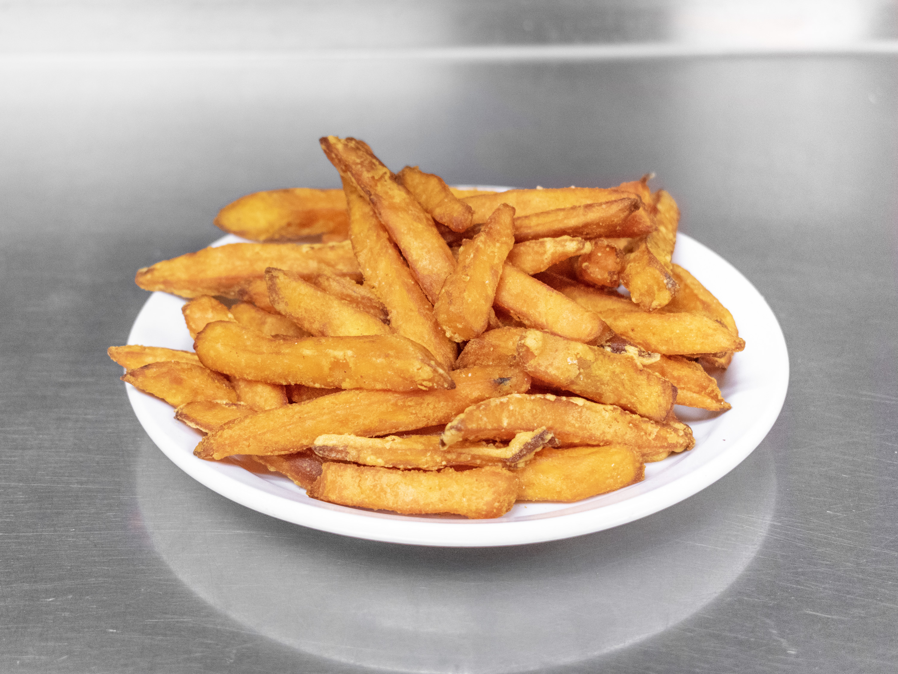 Order French Fries food online from Manchester Cafe store, Manchester on bringmethat.com