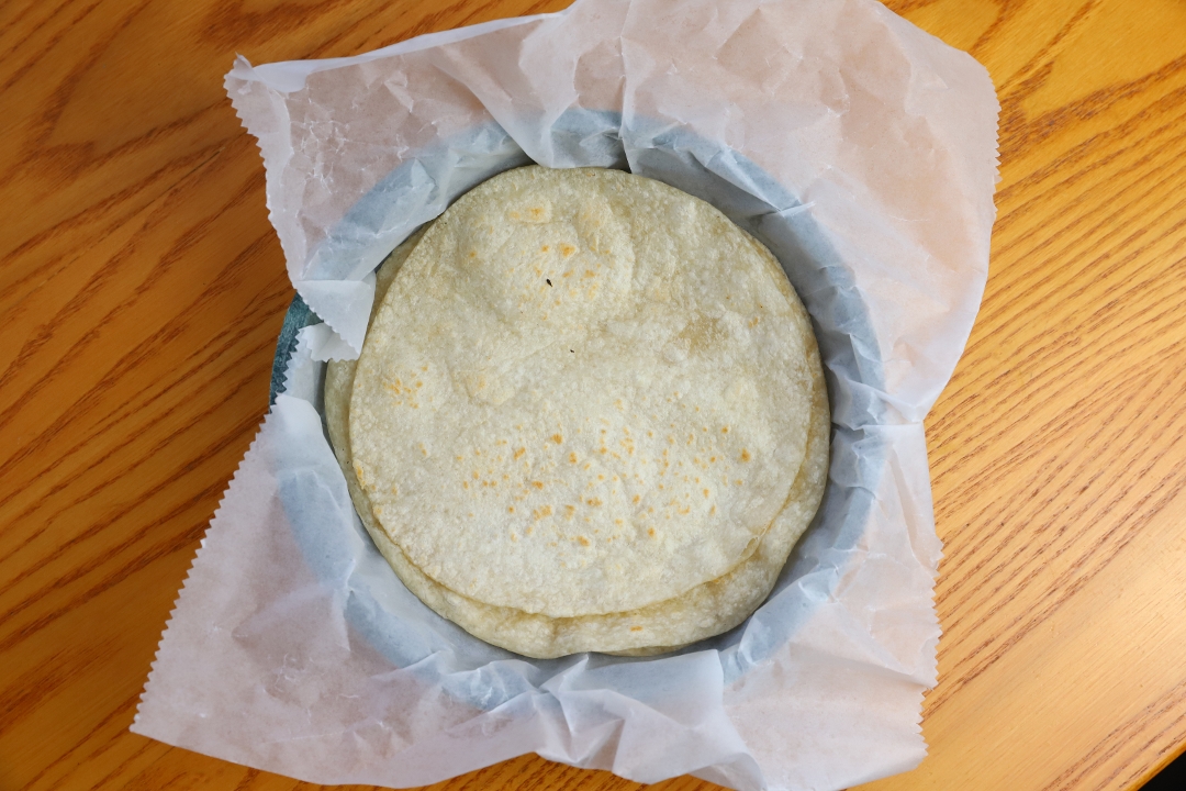 Order Tortilla Flour (1) [Side] food online from Roja Mexican Grill store, Omaha on bringmethat.com