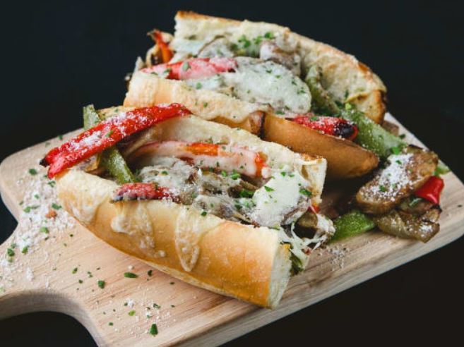 Order Sausage and Peppers Sandwich food online from Napoletano Brothers store, Springfield on bringmethat.com