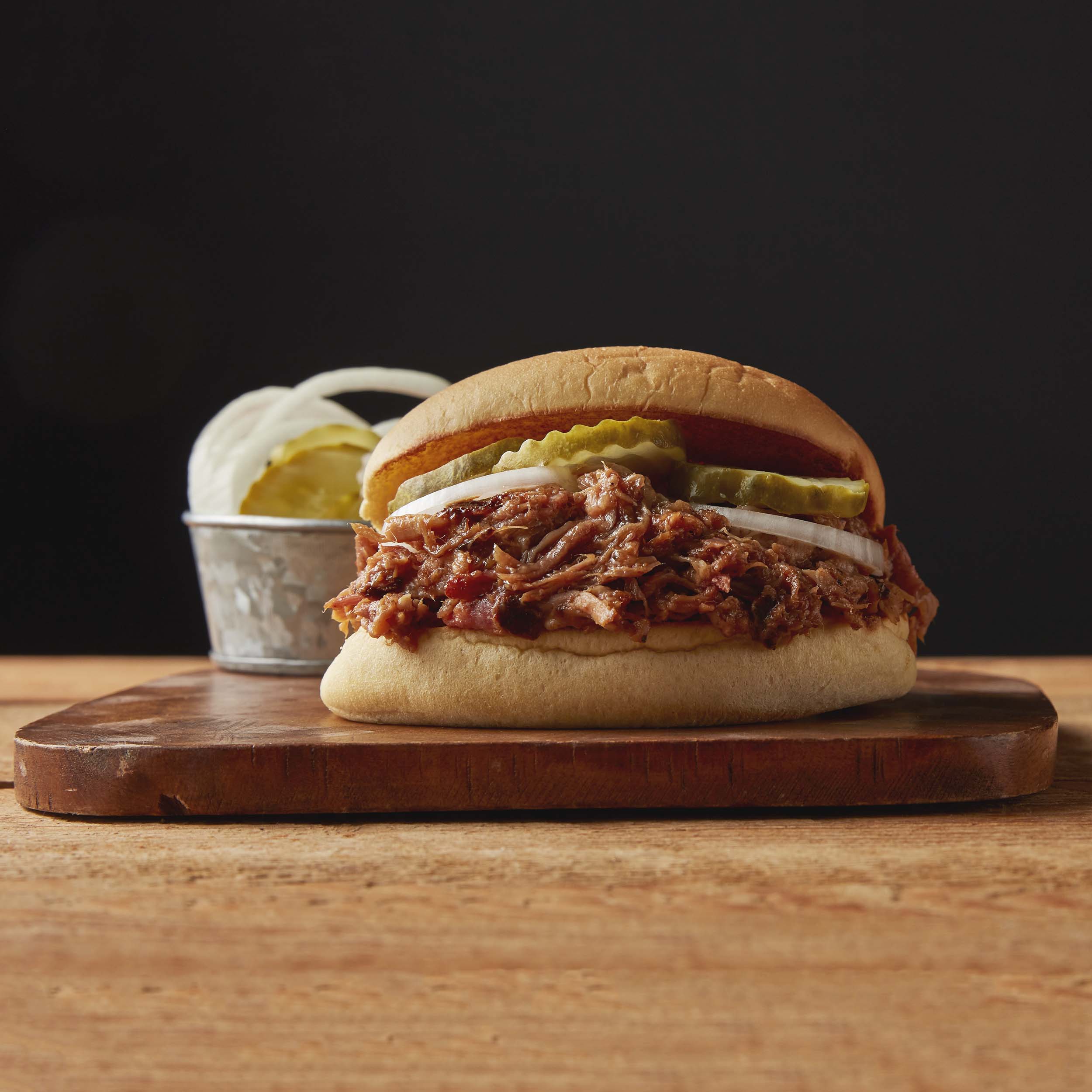 Order Pulled Natural Pork Sandwich food online from True Texas BBQ store, Magnolia on bringmethat.com
