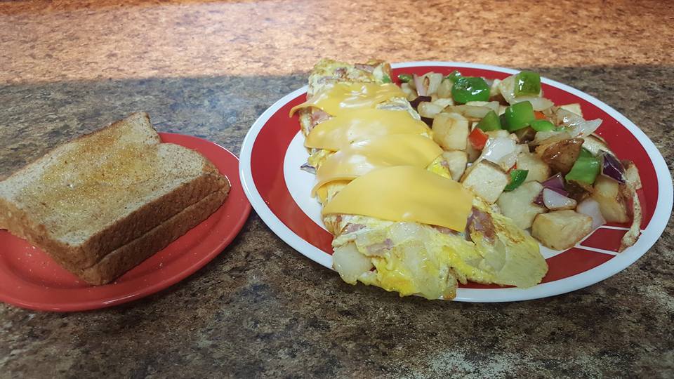Order 17. Western Omelet food online from Johns Cafe store, Plano on bringmethat.com
