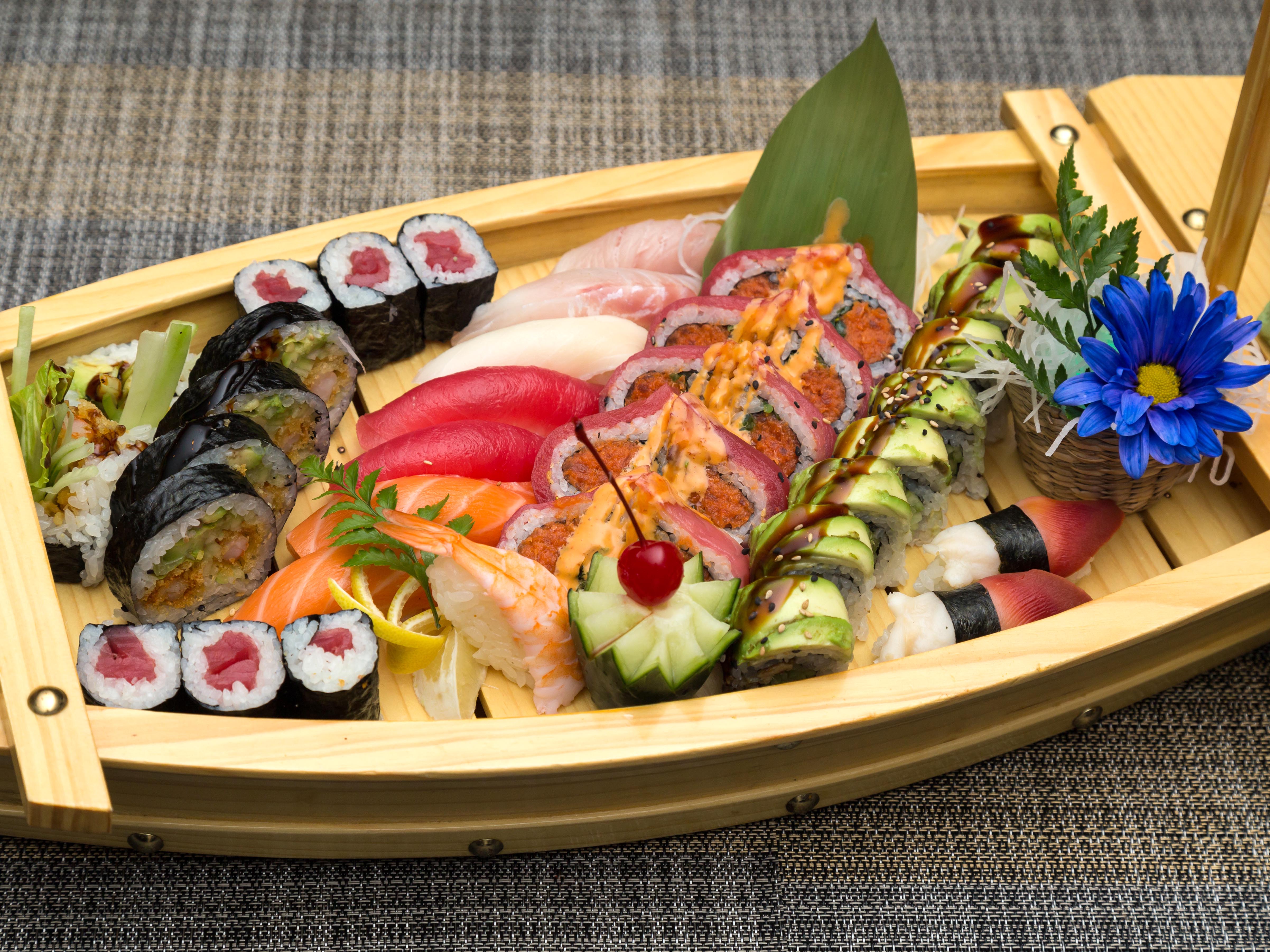 Order B16. Sushi and Sashimi Lover Boat food online from Fusion Wok store, Katy on bringmethat.com
