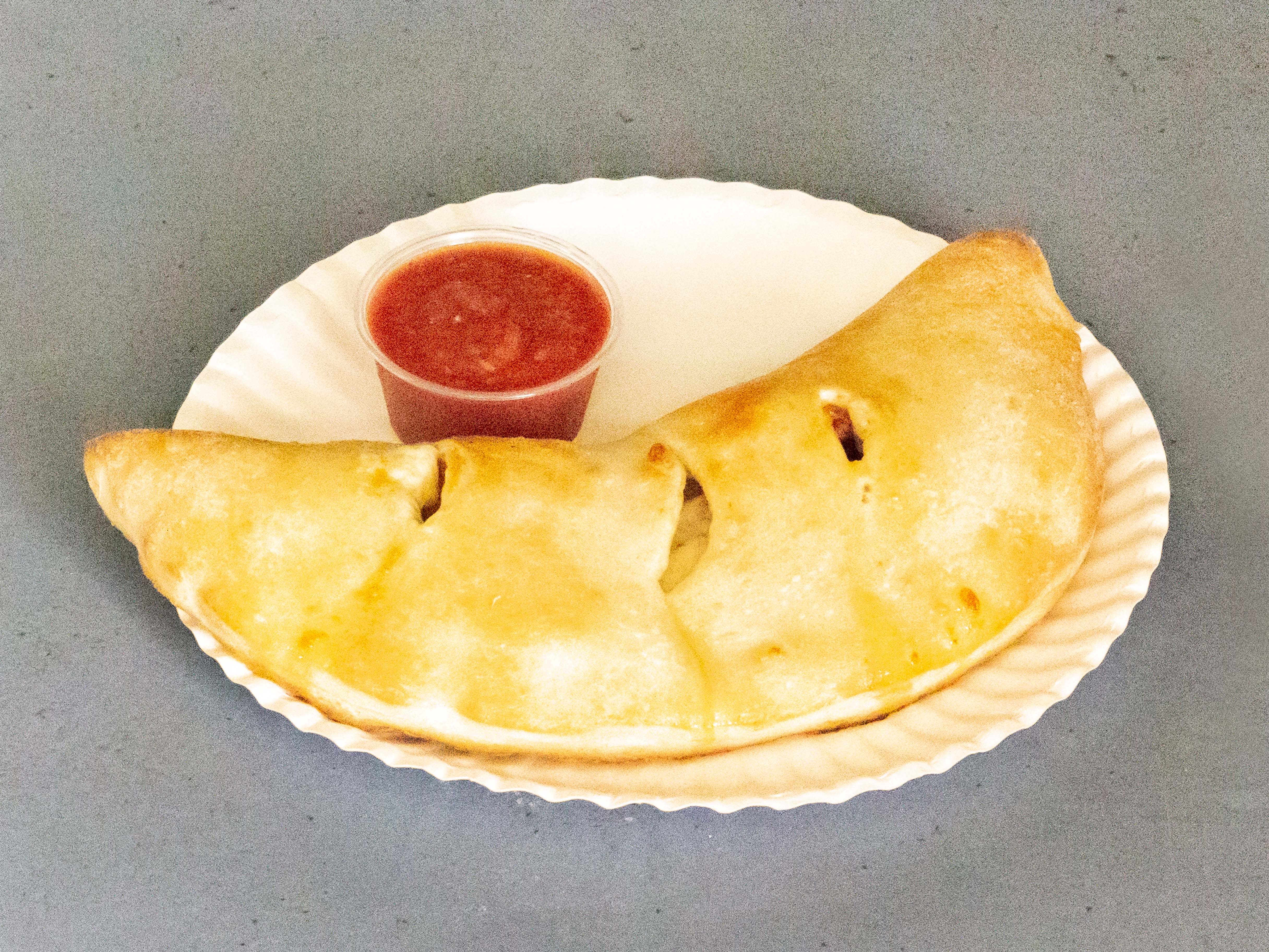 Order Cheese Calzone food online from Manhattan Pizza & Subs store, Greensboro on bringmethat.com
