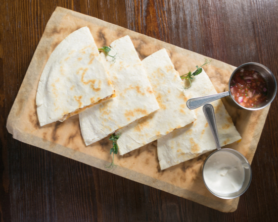 Order Suiza Quesadilla food online from The Burrito Snob store, Woodland on bringmethat.com