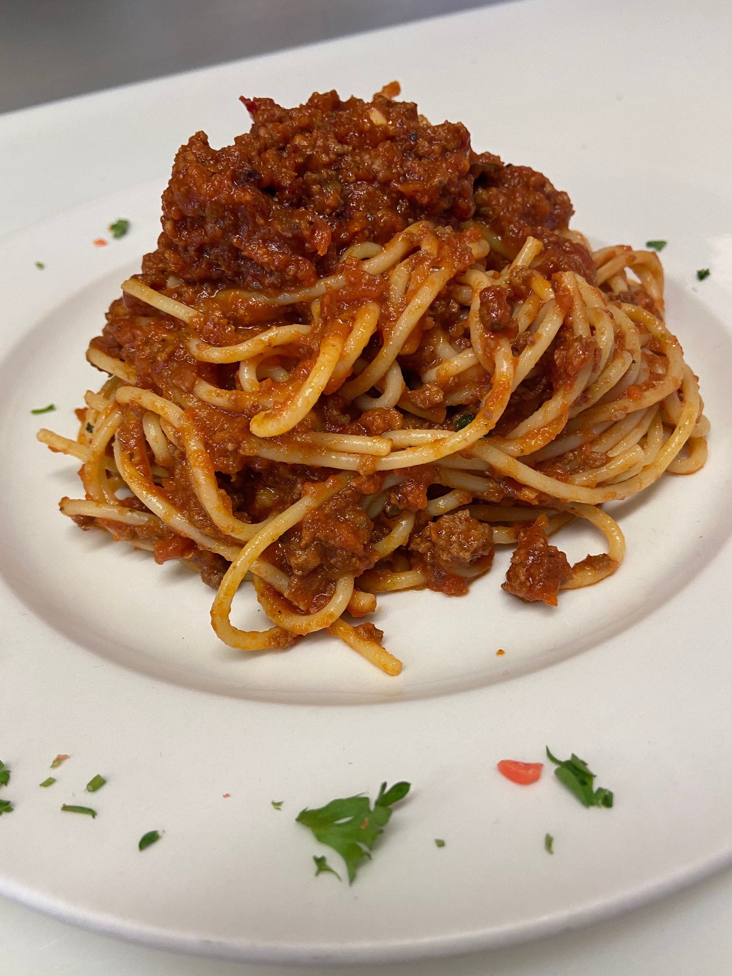 Order Spaghetti Bolognese - Pasta food online from Italian Cravings store, San Clemente on bringmethat.com