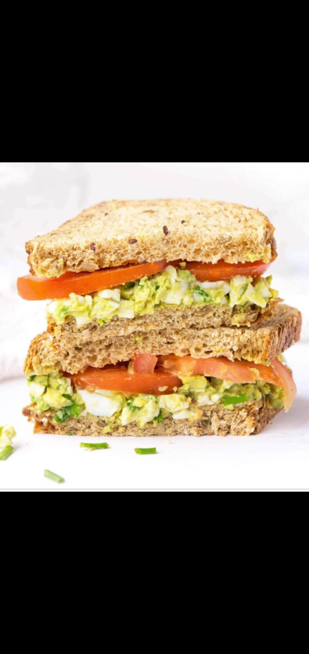 Order Half Avocado & Egg Salad With Tomatoes Sandwich  food online from American Gourmet Foods Deli store, New York on bringmethat.com