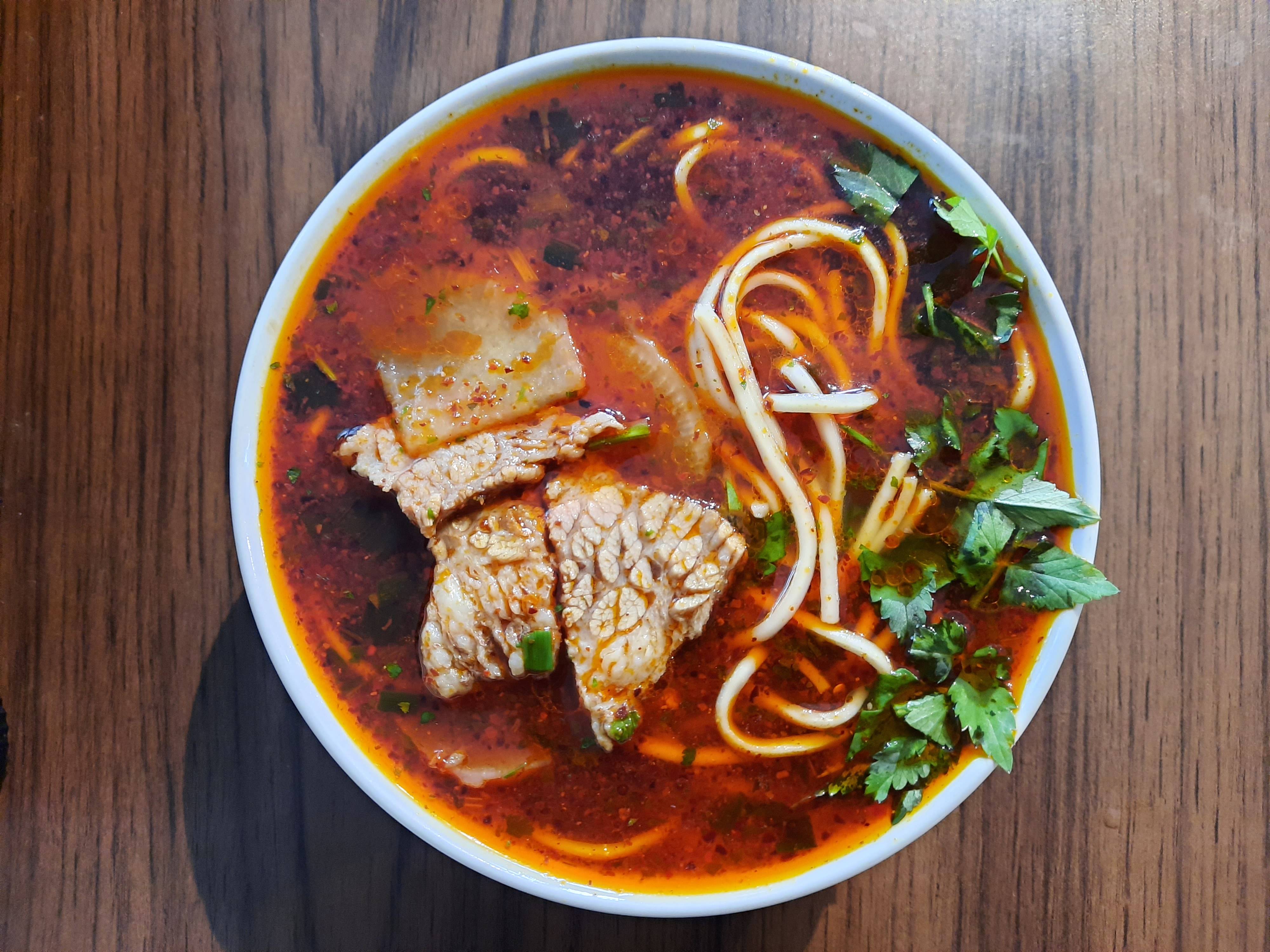 Order Spicy Lanzhou Beef Noodles food online from Gudong Hot Pot Delivery store, Ferguson on bringmethat.com