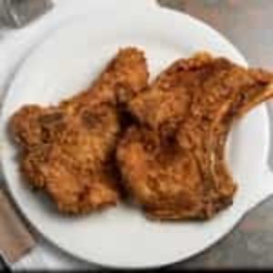 Order Pork Chop food online from Fried Tomato Buffet - Montgomery store, Montgomery on bringmethat.com