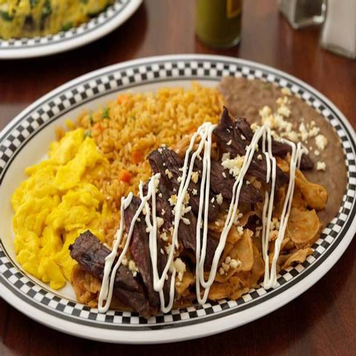 Order Chilaquiles Verdes or Rojos food online from Deluxe Diner store, Chicago on bringmethat.com