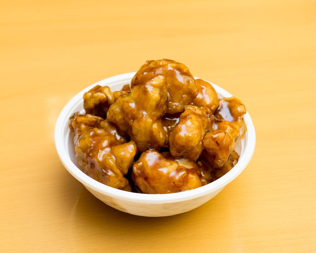 Order Orange Flavored Chicken food online from New China Express store, Chicago on bringmethat.com