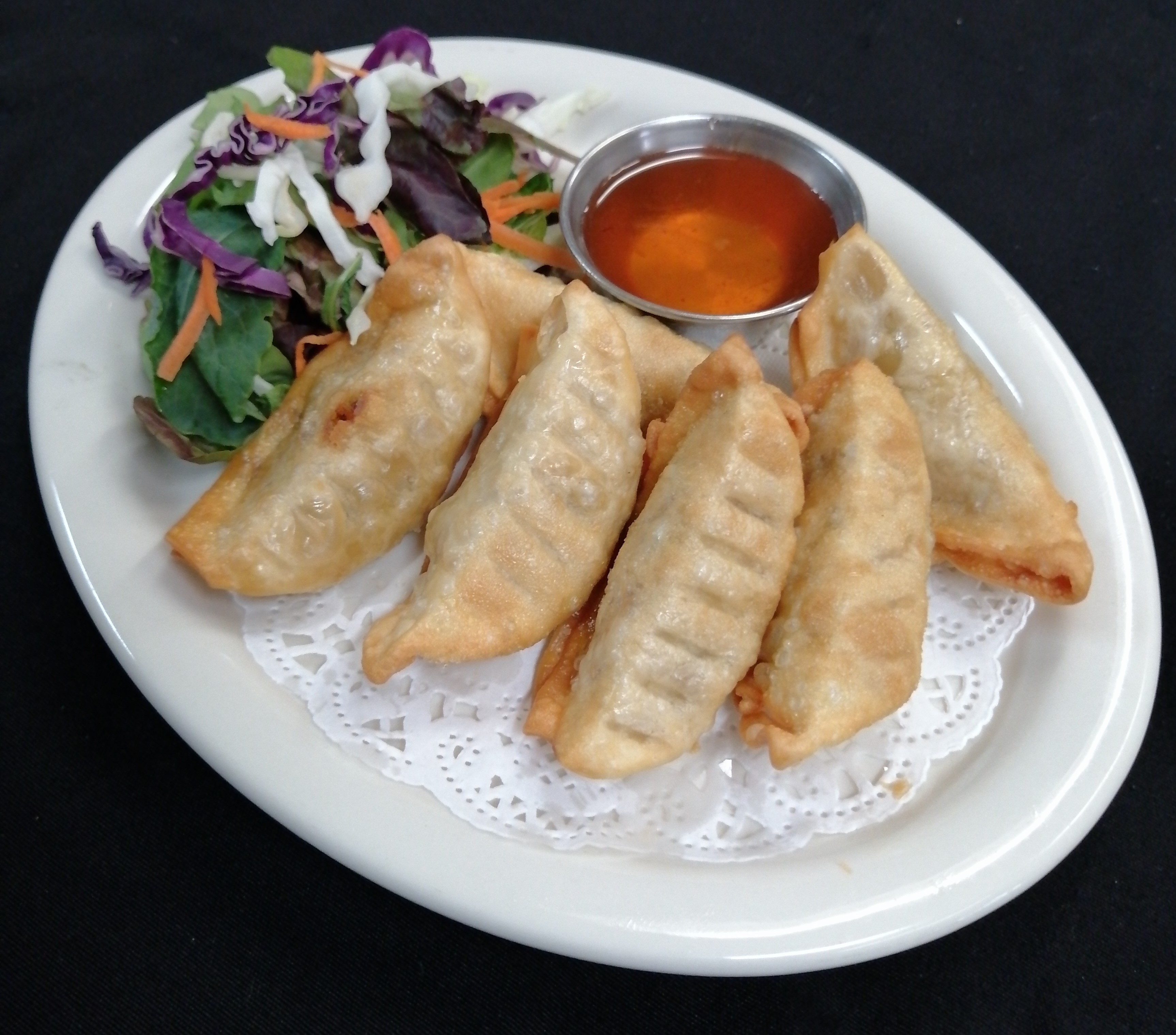 Order Chicken Pot Stickers food online from At Bangkok store, Los Angeles on bringmethat.com